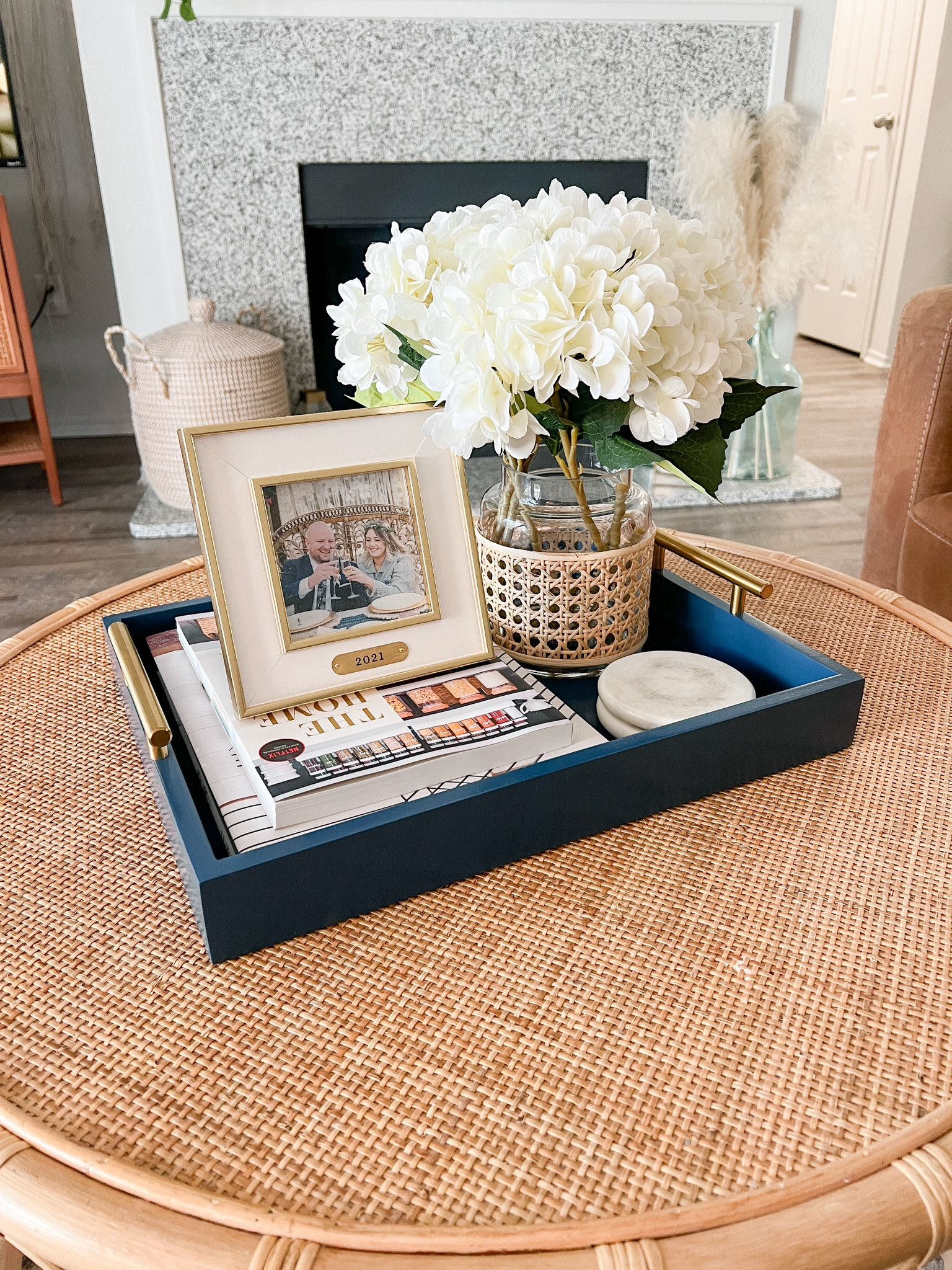 Coffee table styling, coastal grandmillennial, faux flowers, faux hydrangeas, coffee table books

#LTKhome #LTKfindsunder50