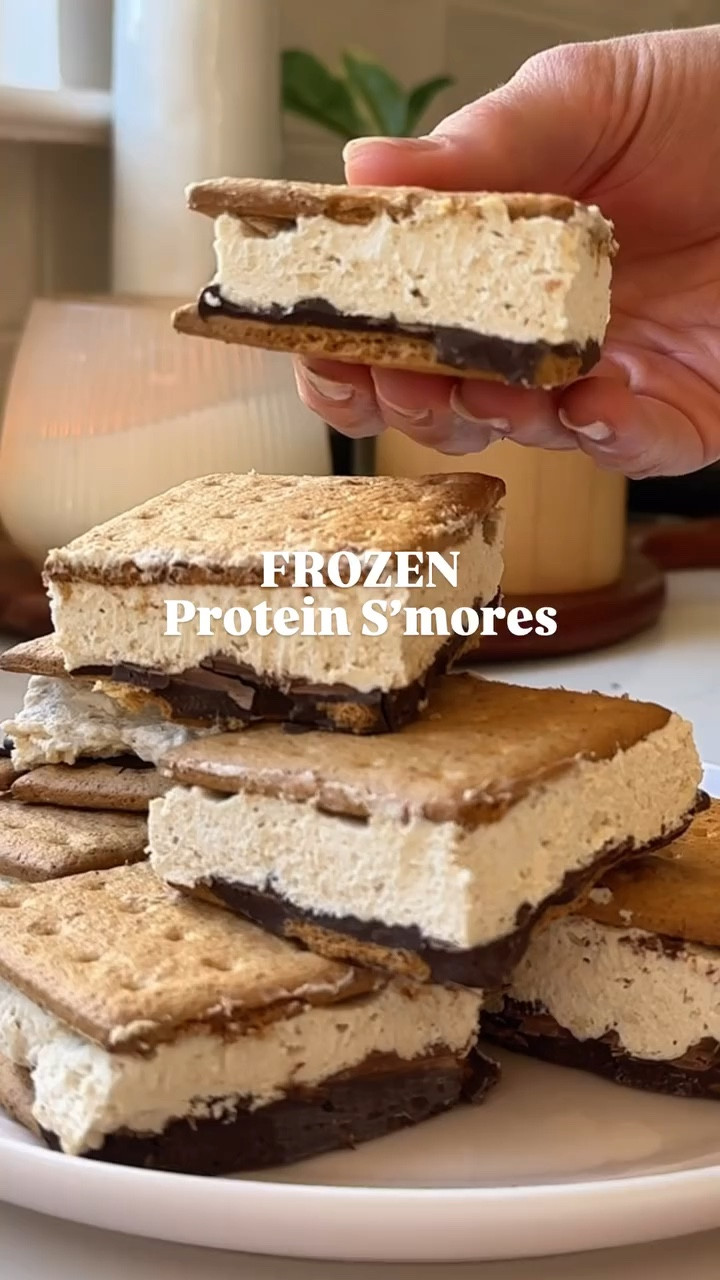 FROZEN S’MORES 🍫 
IB: @gracie_norton

They’re sooo good (they legit taste like s’mores ice cream bar) and they’re super easy to make with just four ingredients. 

I personally love keeping my freezer stocked with healthier treats like this because they’re out of sight out of mind so they’re not tempting me every time I walk in the kitchen, but they’re still there when I’m craving something sweet! 

Here’s how to make them: 
・1 container thawed coco whip 
・1 scoop vanilla protein powder, I used Truvani
・18 graham crackers. I like Trader Joe’s or Partake
・½ cup chocolate chips, I use Lily’s for a low sugar, high fiber option

1️⃣ Line a square 8x8 baking dish with parchment paper. Add graham crackers to cover the bottom of the dish in a single layer. 
2️⃣ Melt chocolate chips and spread over graham crackers in an even layer. 
3️⃣ Mix together coco whip and protein powder until fully combined. Spread on top of the chocolate.
4️⃣ Top with remaining graham crackers. 
5️⃣ Place in the freezer to set for at least 2 hours. Bring out, cut into bars and enjoy!

Macros (serves 9): 173 calories, Fat: 8g, Carbs: 28g, Protein: 4g, Fiber: 4g, Sugar: 4g

#FrozenSmores #FrozenProteinSmores #HealthyTreats #EasySnacks #Homemade #SweetTooth #QuickRecipe

#LTKHome #LTKFamily #LTKActive