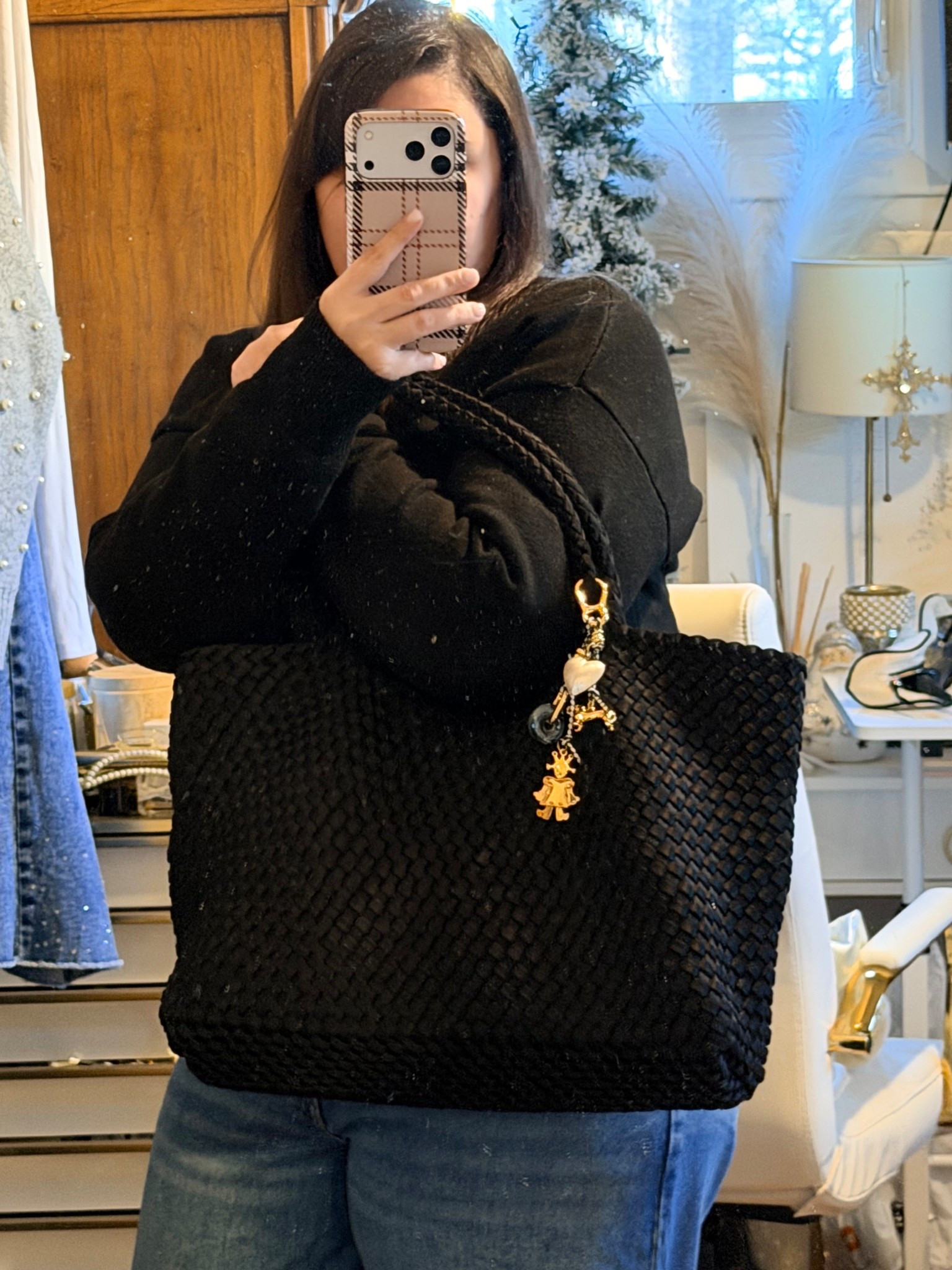 Yikes I really need to clean my mirror. A moment for this bag. It’s so good! It’s perfect for carrying my whole world ha! It kinda stretches the more I put in it yet goes back to its normal size after if that makes sense. It also comes in a few different color options. Is great for travel + the beach! Would make such a good gift!

The bag charm is a dear gift from Paris when my fam went! 

#LTKHoliday #LTKGiftGuide #LTKTravel