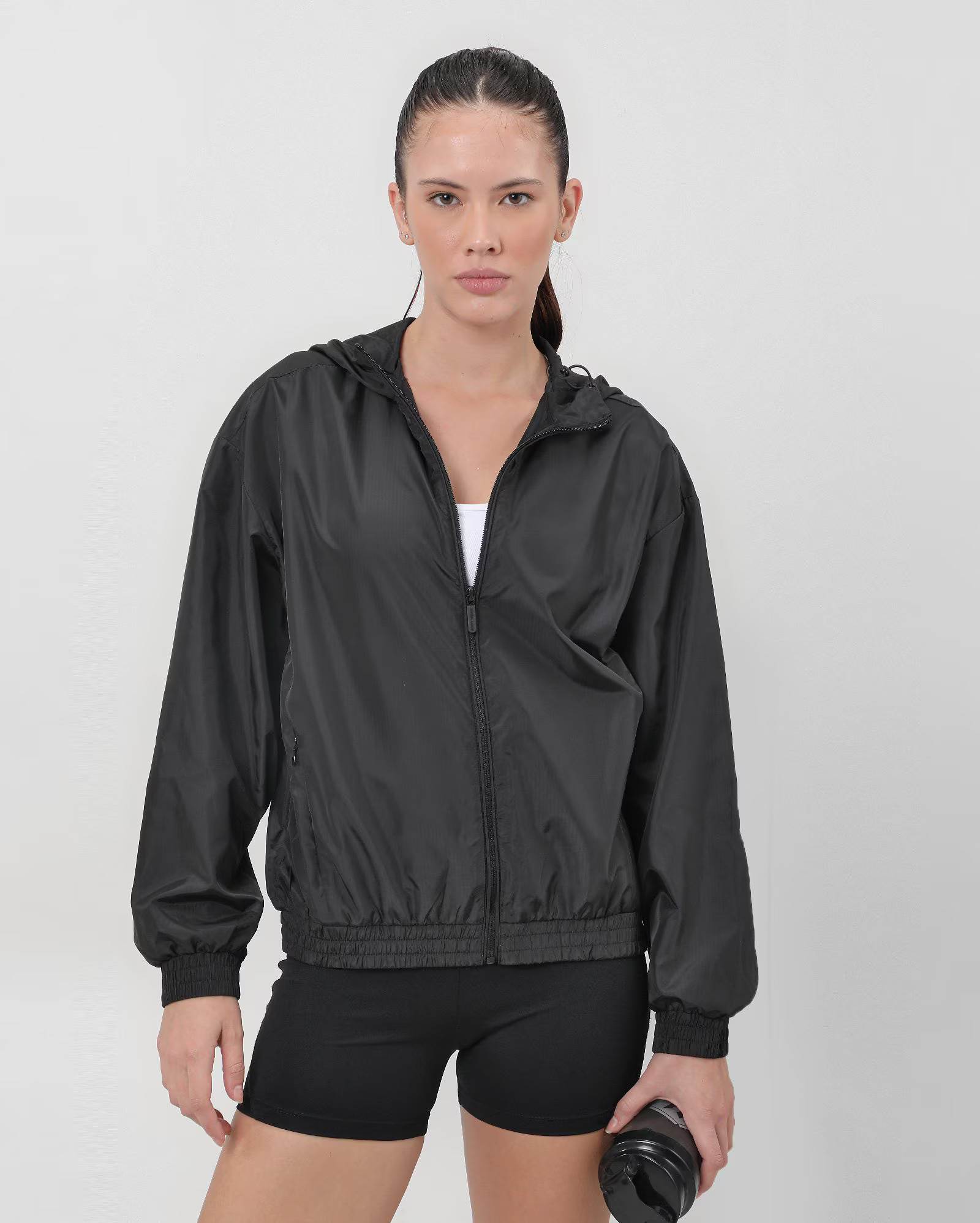 Jaqueta feminina corta vento de corrida capuz preto - Rosa |  BodyWork by Riachuelo | Riachuelo (BR)