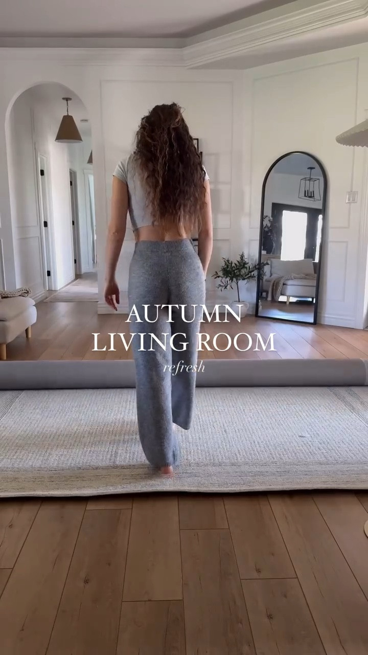 It’s the perfect cozy season rug—subtle and earthy with its warm brown edges and soft grey tones, allowing all your seasonal decor to blend in. This wool beauty feels so plush and soft under my feet! 
