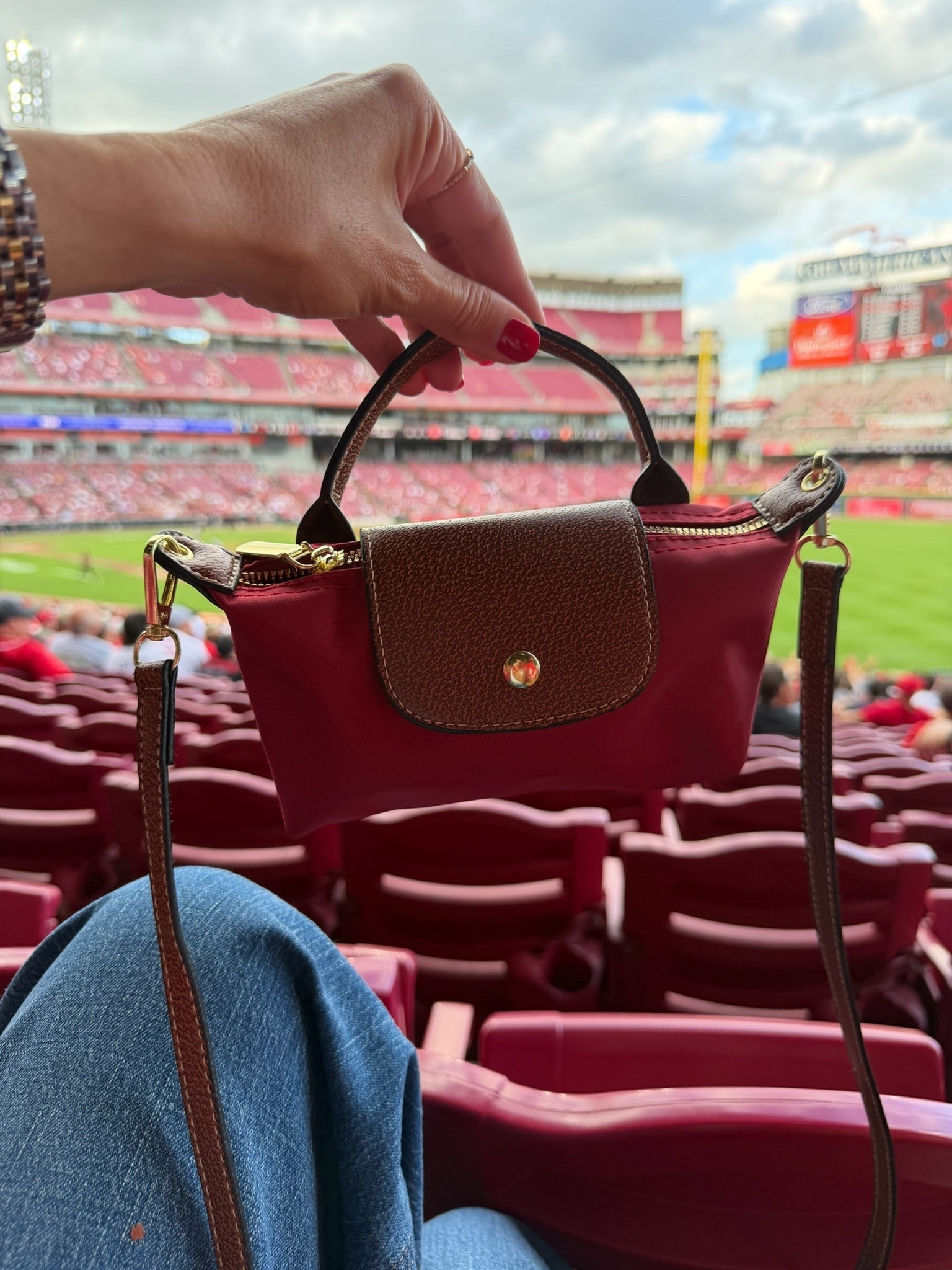 This little burgundy crossbody is such a cute game day bag and the perfect size when you only need the essentials. I love the rich fall color with the brown trim and gold hardware, and it works just as well for concerts, travel, or everyday errands.

burgundy crossbody bag, game day bag, mini crossbody, fall handbag, stadium bag, small purse, fall accessories, everyday crossbody, themominstyle

#LTKootd #LTKdayinmylife #LTKSeasonal