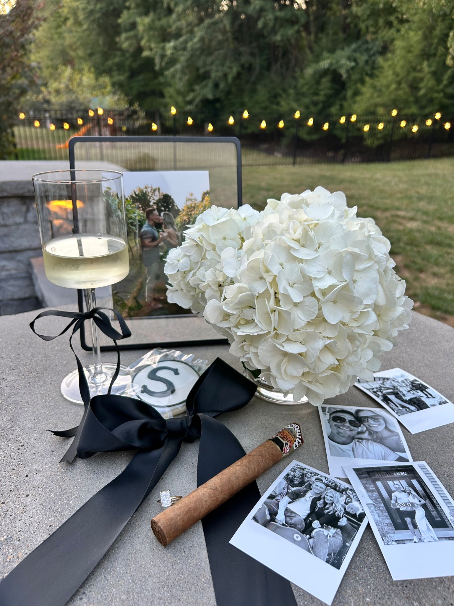 September engagement party 🖤

Black and white 
Wine glasses
Black bow
Flowers
Ribbon
Photo
Party
Event
Planning
Decor 

#LTKWedding #LTKHome #LTKU