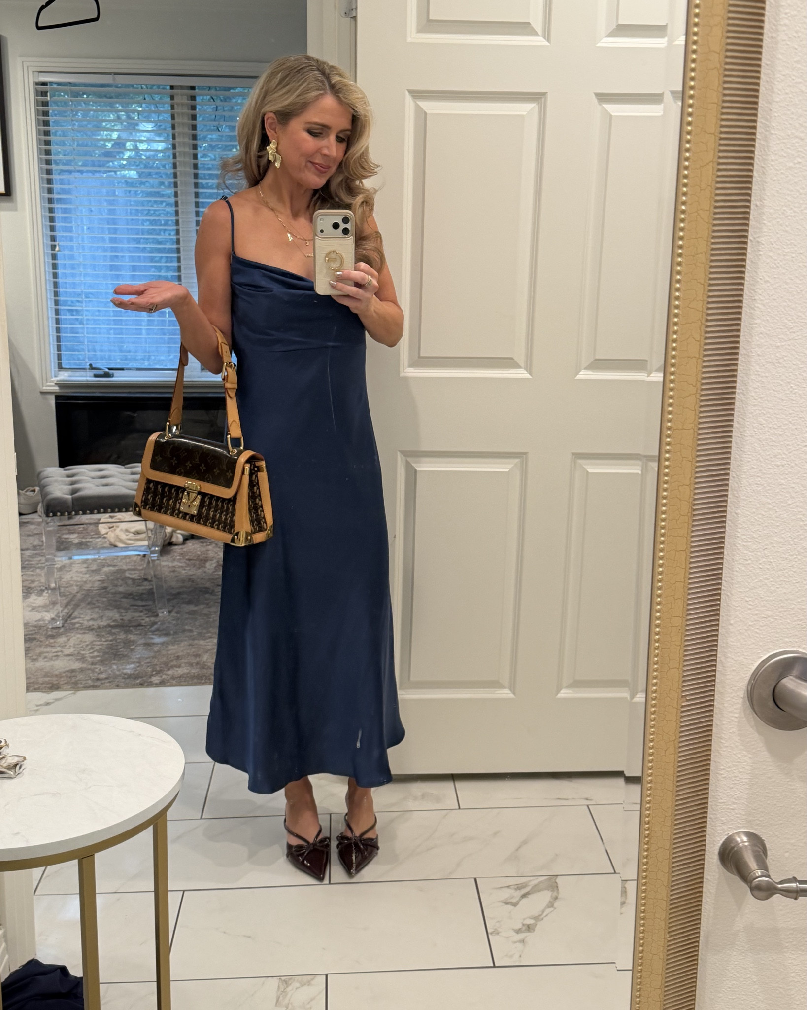 I chaired a Luncheon benefiting our local education foundation this past month and decided to order this silk maxi dress for it! I felt so beautiful in it! I highly recommend this dress for any fall weddings you may be attending! It looks much more expensive than it is and was super comfortable! I paired it with these shoes from Target, a purse I’ve had forever, and these gold earrings I found on Amazon!

#LTKParties #LTKHoliday #LTKFindsUnder100