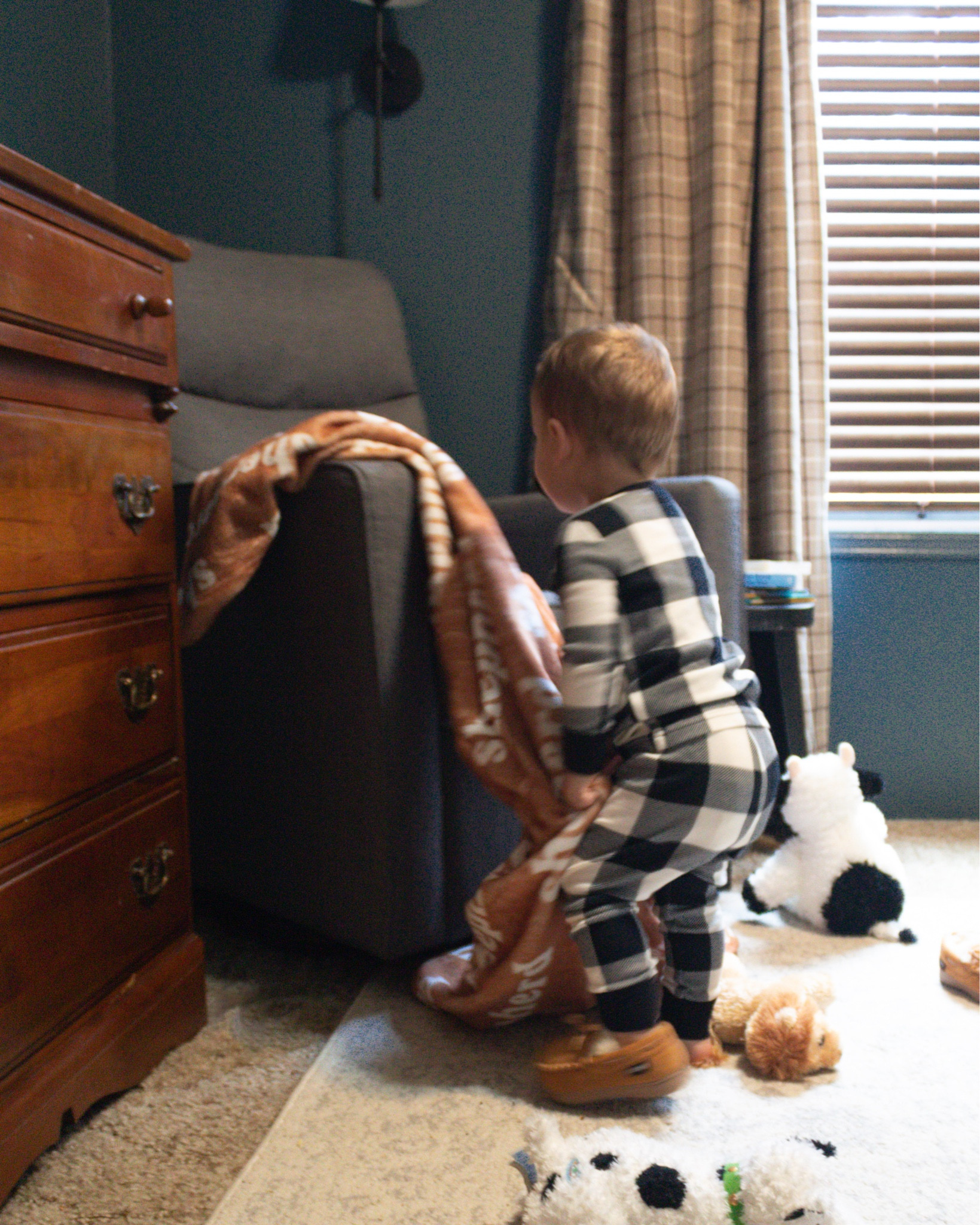 Getting ready in our holiday plaid. And yes, there’s matching ones for the whole family! 

Toddler pjs. Family holiday pajamas. Nursery. Baby boy bedroom. Blue bedroom. Plaid curtains. Slippers for toddlers 

#LTKhome #LTKHoliday #LTKkids