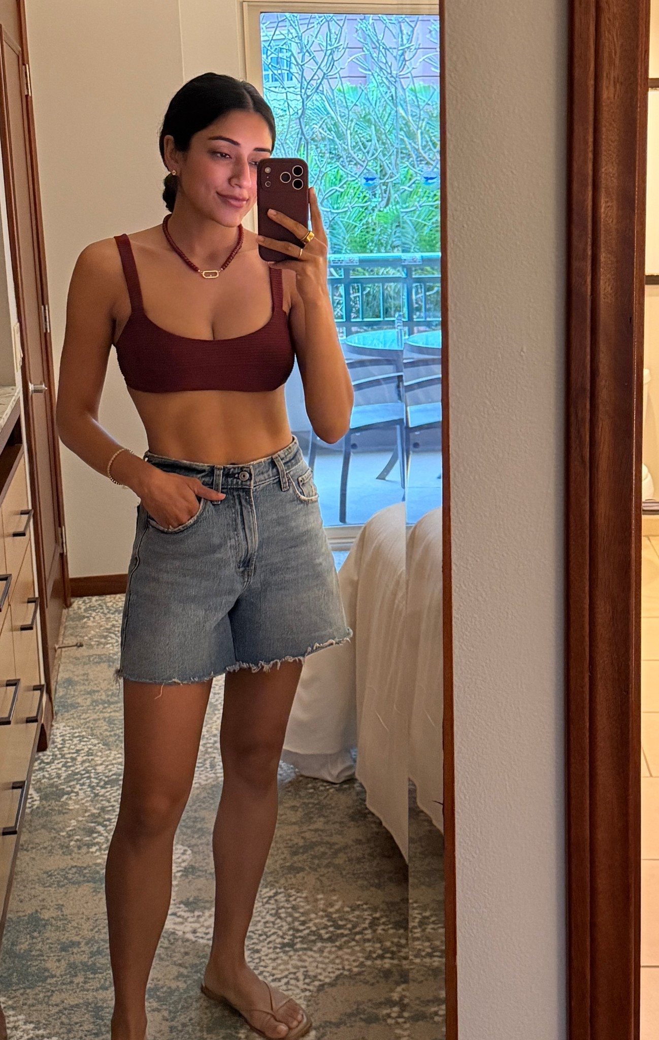 Beach bound! 🏝️ these are by far the best denim shorts I’ve ever owned. Long, zip fly, loose in the leg and some stretch. Wearing a size 25 (TTS). Wearing a medium top and bottom in my high waisted swim.
