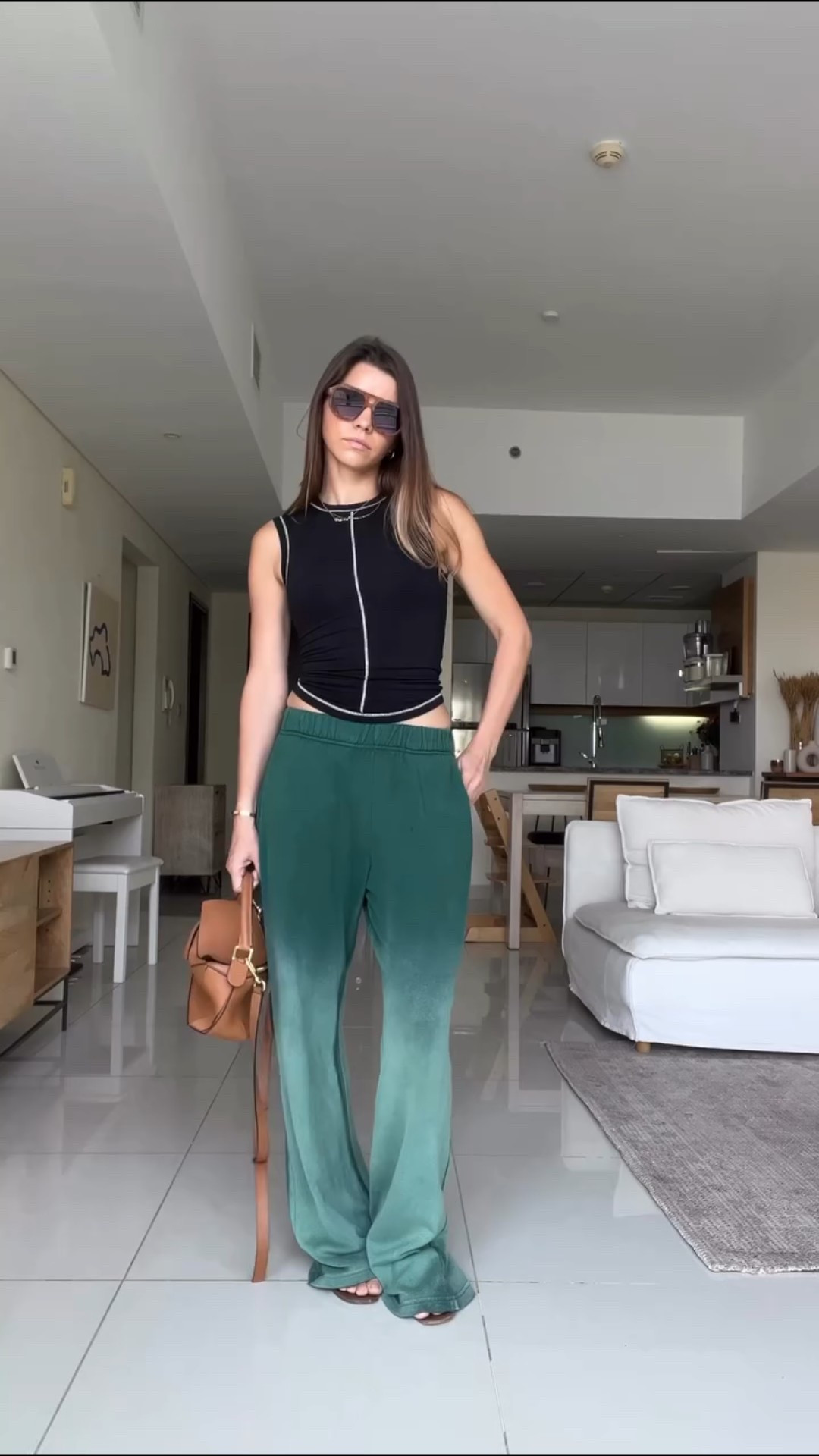 Green bleached sweatpants styled with a fitted black tank and finished with a caramel Loewe puzzle bag.
Relaxed, but still intentional. The contrast between sporty and structured makes it feel balanced and effortless.

#LTKmomlife #LTKootd #LTKdayinmylife