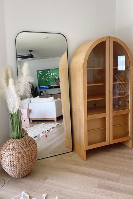 House decor 
Storage cabinet
Coastal living 
Florida home 
Large mirror
Floor mirror 