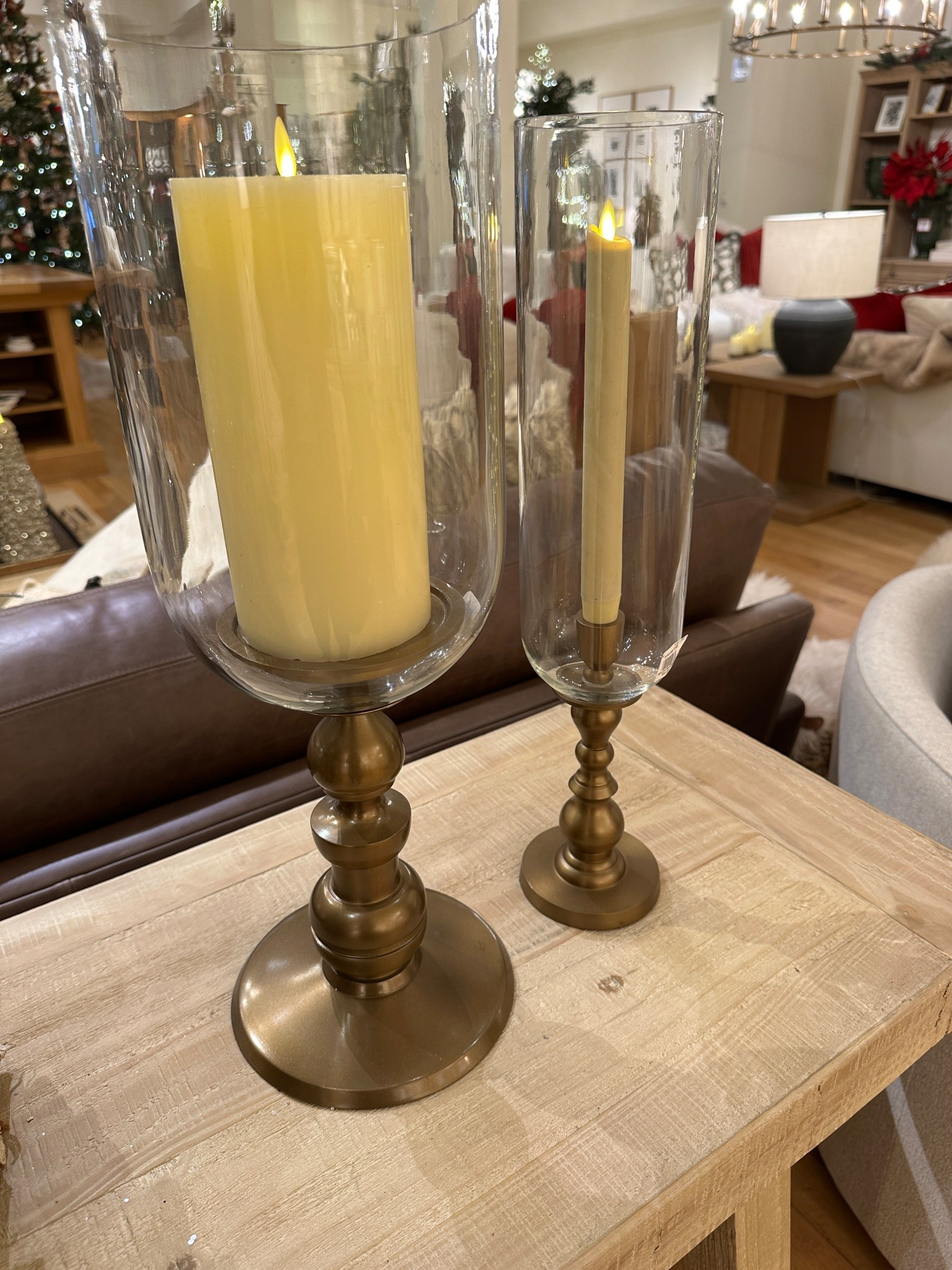 Brass hurricane candle holders for taper and pillar candles.  Great pieces to create a Ralph Lauren Christmas vibe for your holiday table!

#LTKHoliday #LTKFindsUnder100 #LTKHome