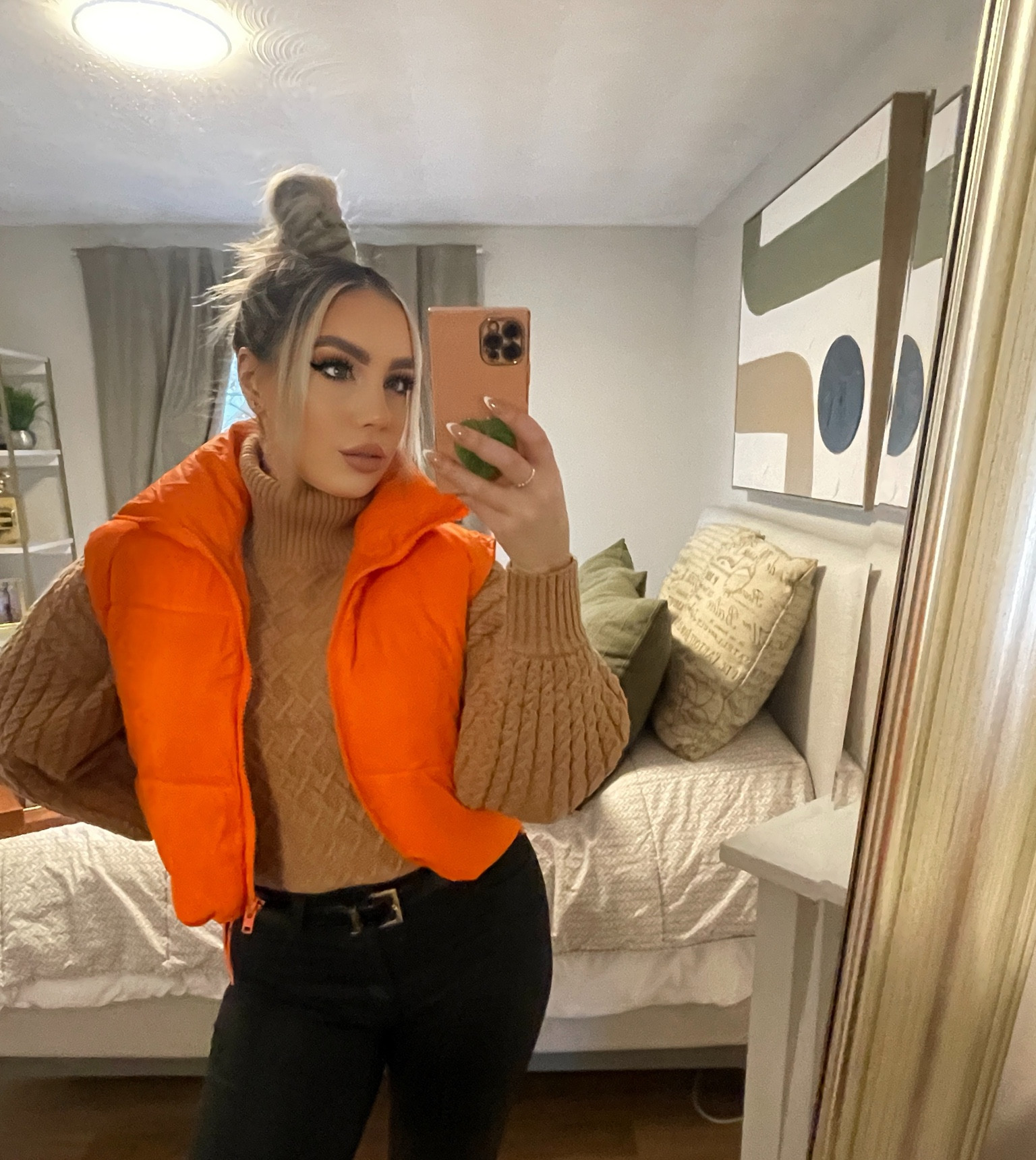 Orange puffer vest and tan turtleneck! These are to match my platform UGGs! 

#LTKFindsUnder100 #LTKStyleTip #LTKShoeCrush