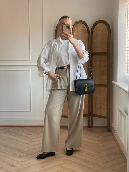 White long sleeve shirt, wide leg trousers, crossbody leather bag, leather ballet flats, leather belt, white t-shirt

#LTKstyletip #LTKSeasonal #LTKeurope