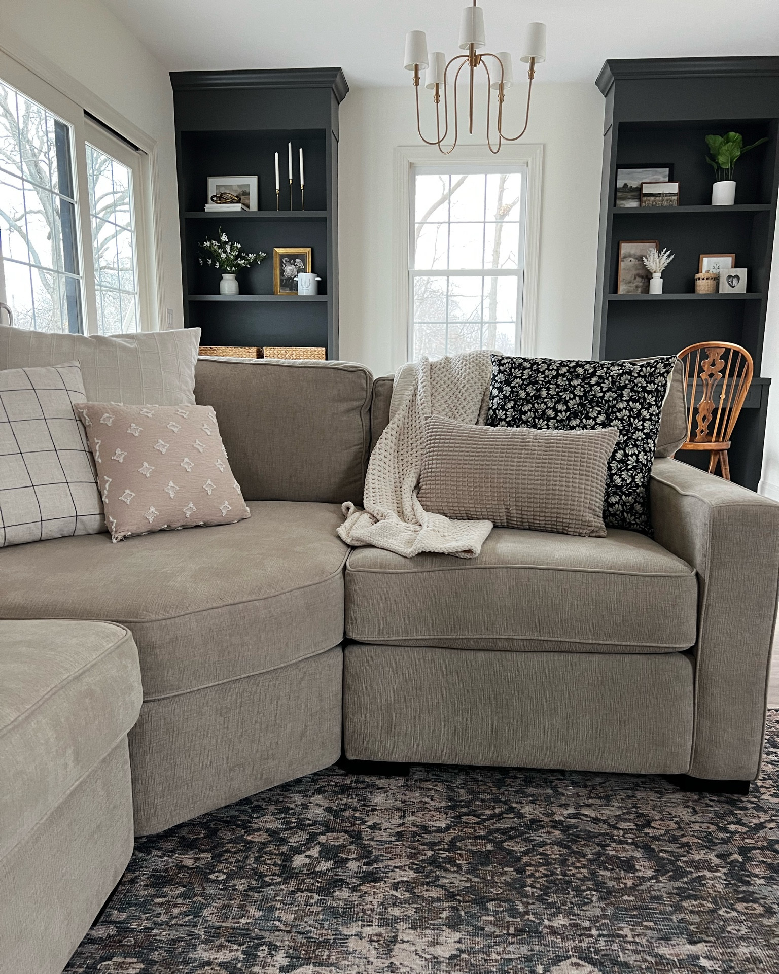 Living room shot! Throw pillow combination, Amazon home decor, target home decor, loloi rug, brass chandelier, brass ceiling light, shelf decor

#LTKMostLoved #LTKhome #LTKstyletip