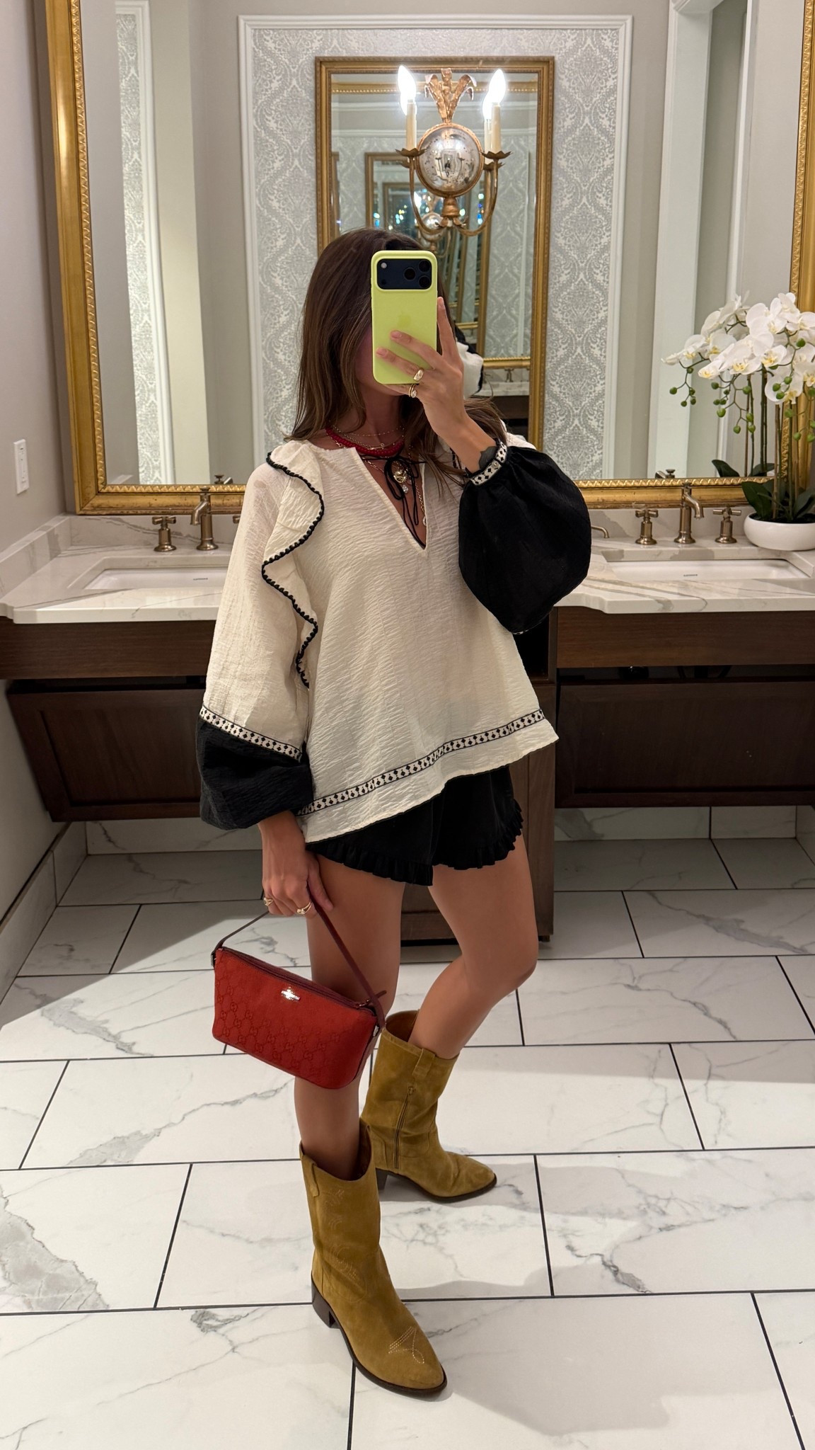 Small top! I cut the tassels off. I just wear nude triangle bra under. My exact shorts are Brandy Melville (not online) but the Abercrombie pair prob would have been better! Boots are tts!
