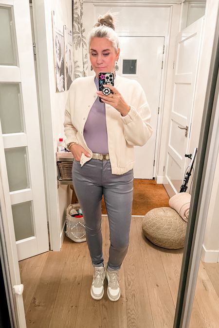 Ootd - Wednesday. Wearing a dusty blue Skims mock neck top under a beige knitted bomber jacket paired with grey coated tall jeans and high top Fila sneakers. 

 

#LTKeurope #LTKmidsize #LTKstyletip