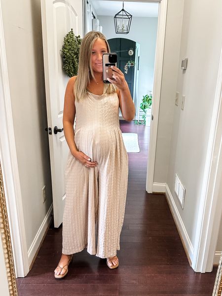 Comfy, cute and dressed up jumpsuit that fits the bump! Paired with the cutest strappy sandals. Sized up to a large in the jumpsuit for room to grow. Perfect date night, rehearsal dinner and going out outfit for the spring/summer  

#LTKstyletip #LTKbump #LTKshoecrush