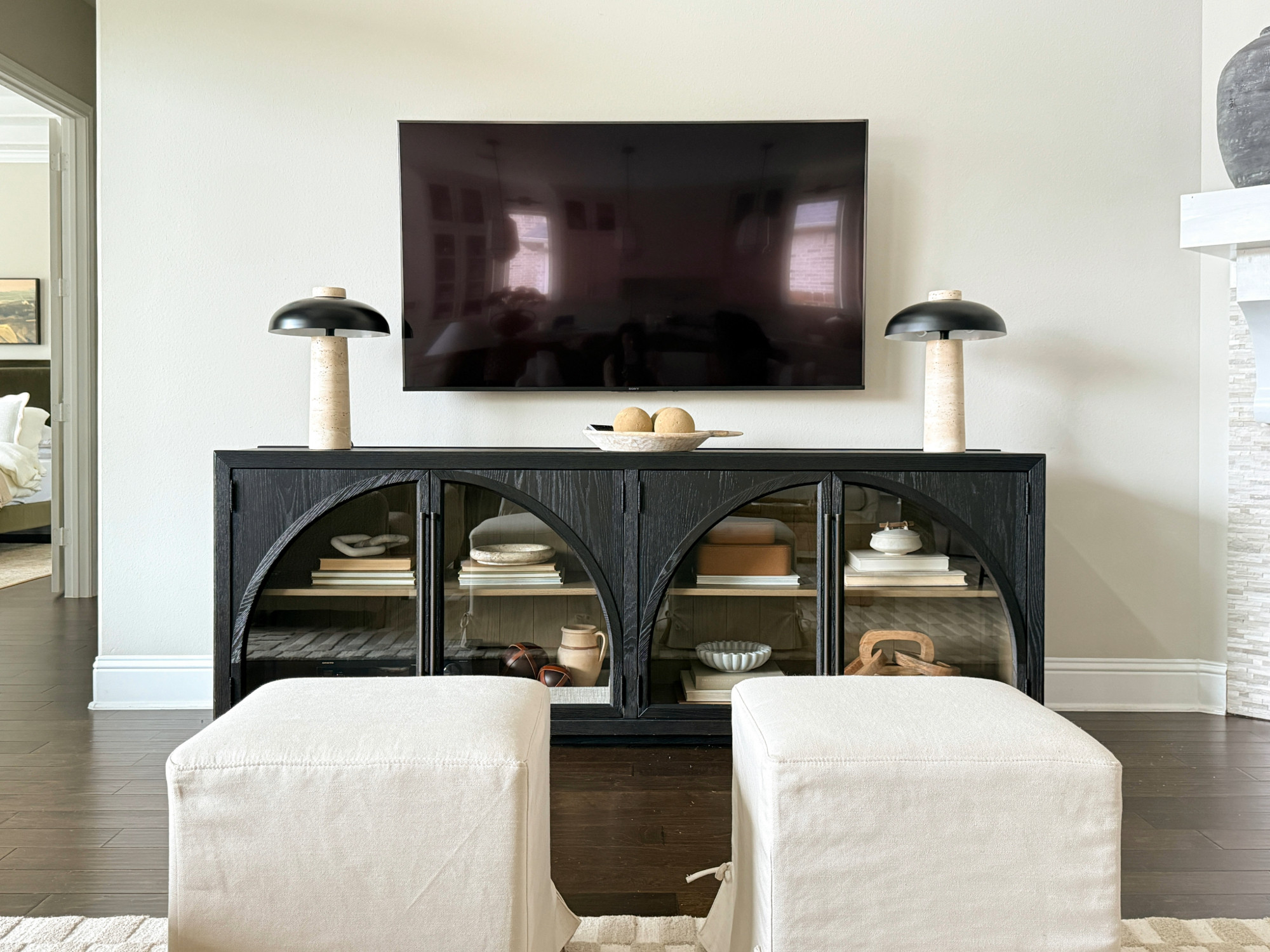 Living Room. Sale Alert! Memorial Day Sale on my Arhaus Sideboard and modern stone lamps. 

console table, media cabinet, tv stand, mid-century modern, target ottomans, beige cloth ottomans, black media cabinet, vintage media cabinet, arhaus sale, arhaus cabinet, beige white gray 

 

#LTKSaleAlert #LTKHome #LTKSeasonal