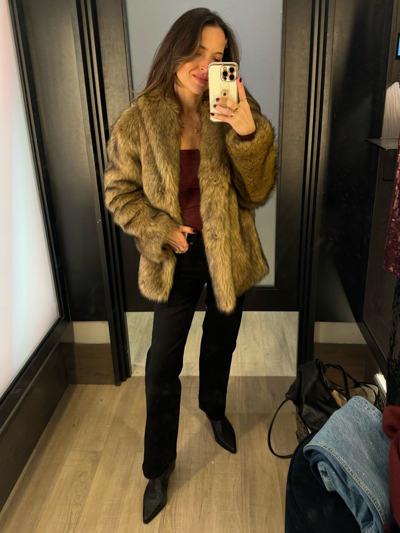 Faux fur coat from Abercrombie is currently $107! It looks so high end and is actually very warm! Quality is 🫶🏻 runs true to size, wearing Small here  

#LTKSeasonal #LTKFindsUnder100 #LTKHoliday