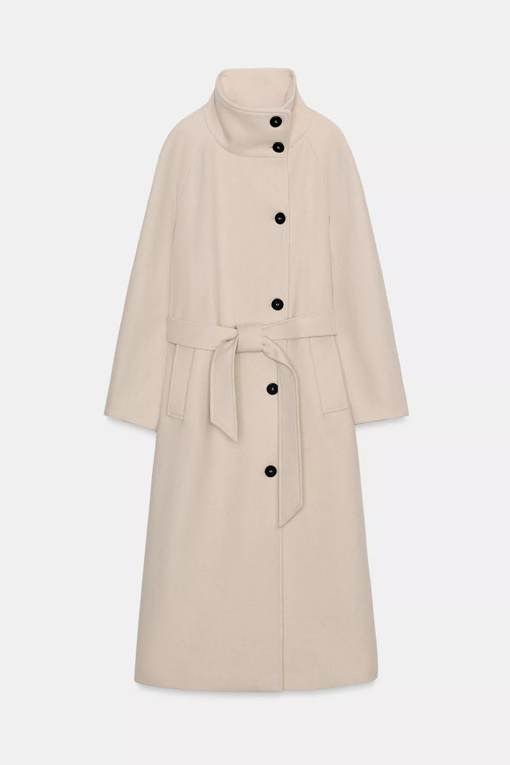Coat made of wool. High neck and long sleeves. Front welt pockets. Belt detail. Hem with back ven... | Zara US