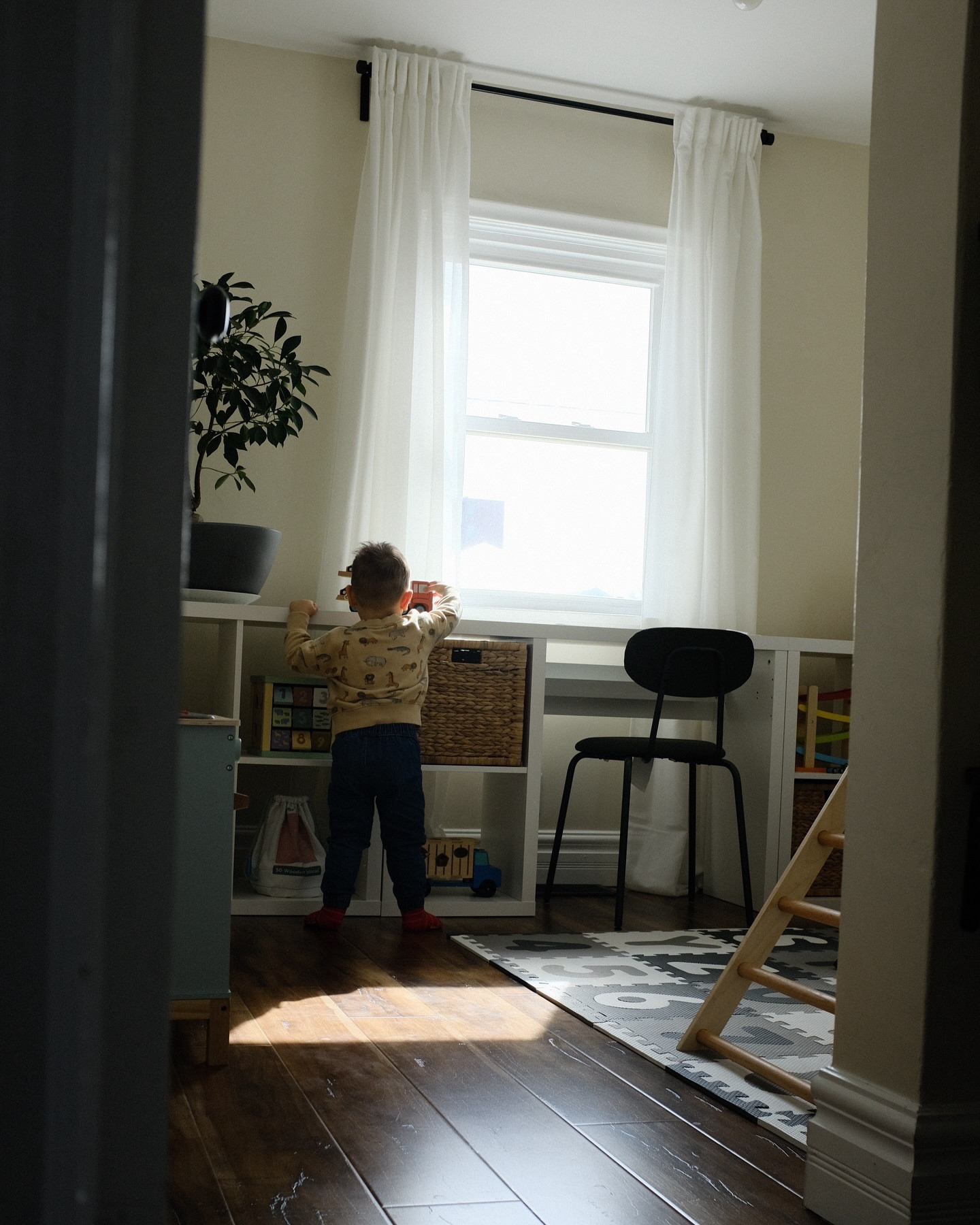 welcome to our favourite room in the house 🦁🌲🦒✨

sharing some stills of our dream playroom, along with some new additions! (while I’m busy editing the next reno to post for y’all AH!)

we’ve added more to the room + walls including a custom guitar, a thrifted aesthetic rattan hot air balloon, and one of my most treasured possessions, a limited edition print from @minalimadesign! I got this print YEARS ago and always knew I wanted to frame it and put it somewhere special. After going to london last summer and actually visiting the minalima gallery in person with our son, I figured there was no better place to add a touch of my fav series into this playroom for that extra magical touch! ✨🐉

we spend so much time in here, and I’m so happy with how this neutral, montessori-inspired playroom turned out! 

what do you think — did we turn this sad beige room into a fun beige room? 🤎

#playroominspo #playroom #neutralplayroom #montessoriplayroom #playroomdecor #playroomdesign

#LTKhome #LTKkids #LTKbaby