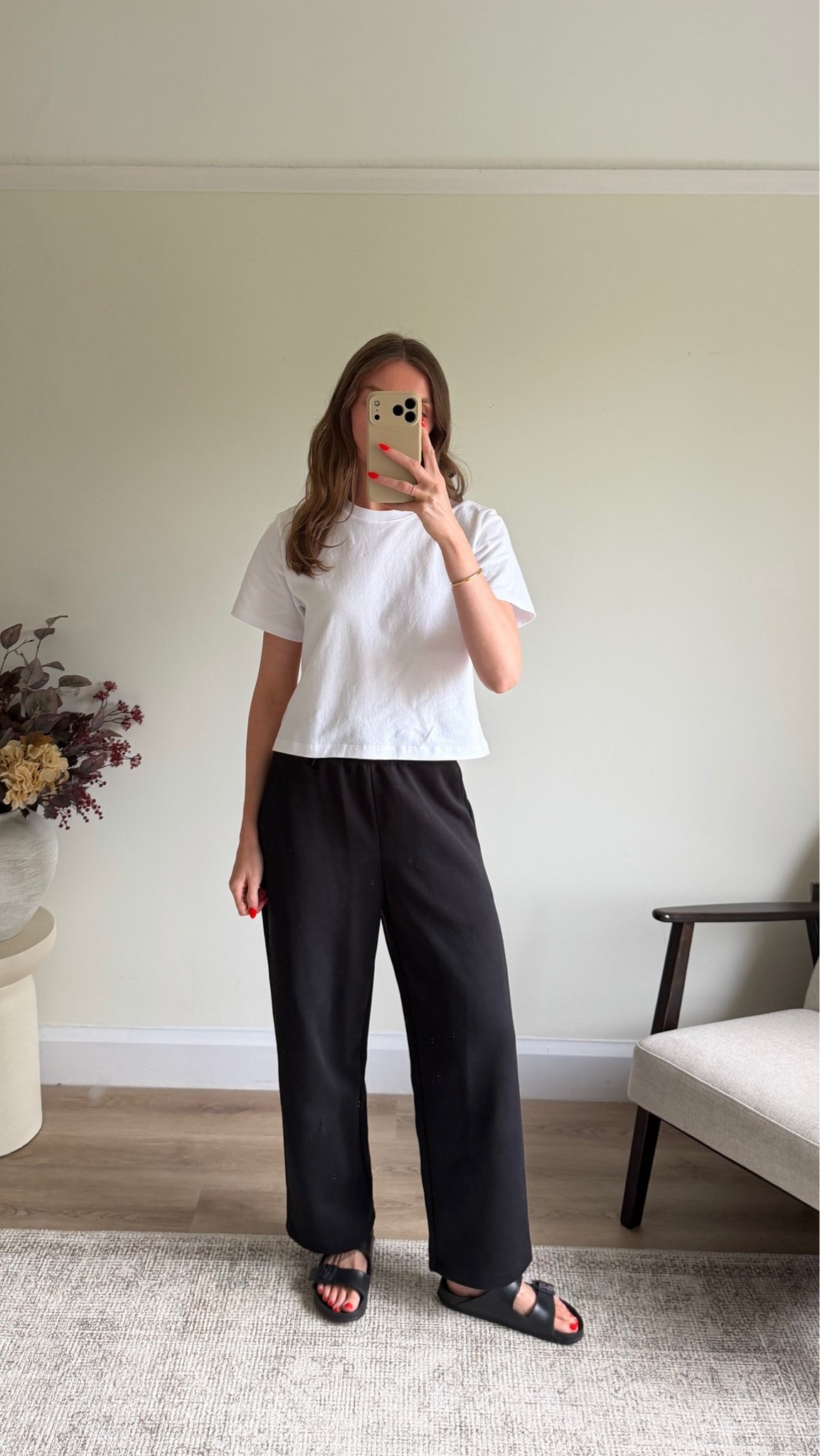 Small in the UNIQLO boxy tee
small in the black sweat wife trousers
I’m 5ft 6 
Birkenstock sandals