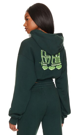 x REVOLVE Love Over Everything Cropped Zip Hoodie in Evergreen | Revolve Clothing (Global)