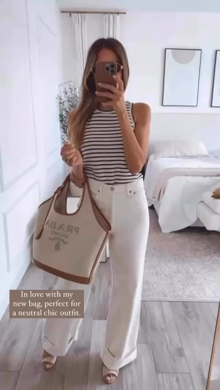 Neutral chic summer outfit idea.
My new Prada tote is so beautiful and chic.
Top runs true to size, I’m wearing size small and these pants run large so order one size down 
I am wearing a size 26 


#LTKStyleTip #LTKSeasonal #LTKOver40