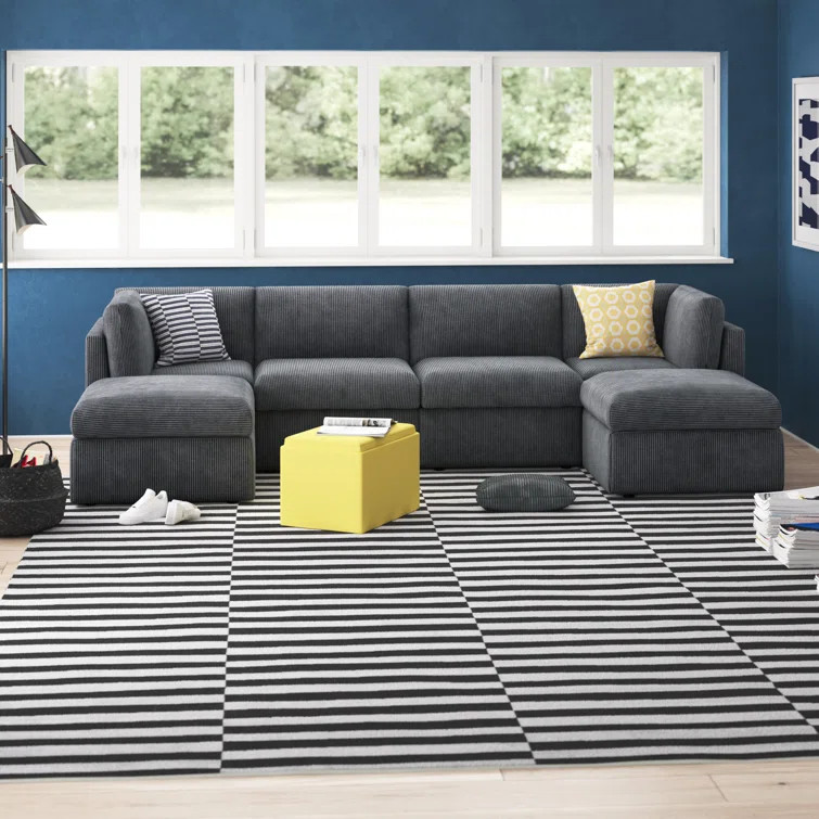 Annai 129" Wide Reversible Modular Corner Sectional with Ottoman | Wayfair North America