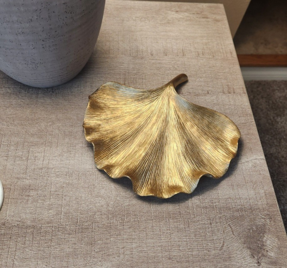Love this gold leaf tray. It's at a great price and great quality!

#LTKFindsUnder50 #LTKHome #LTKStyleTip