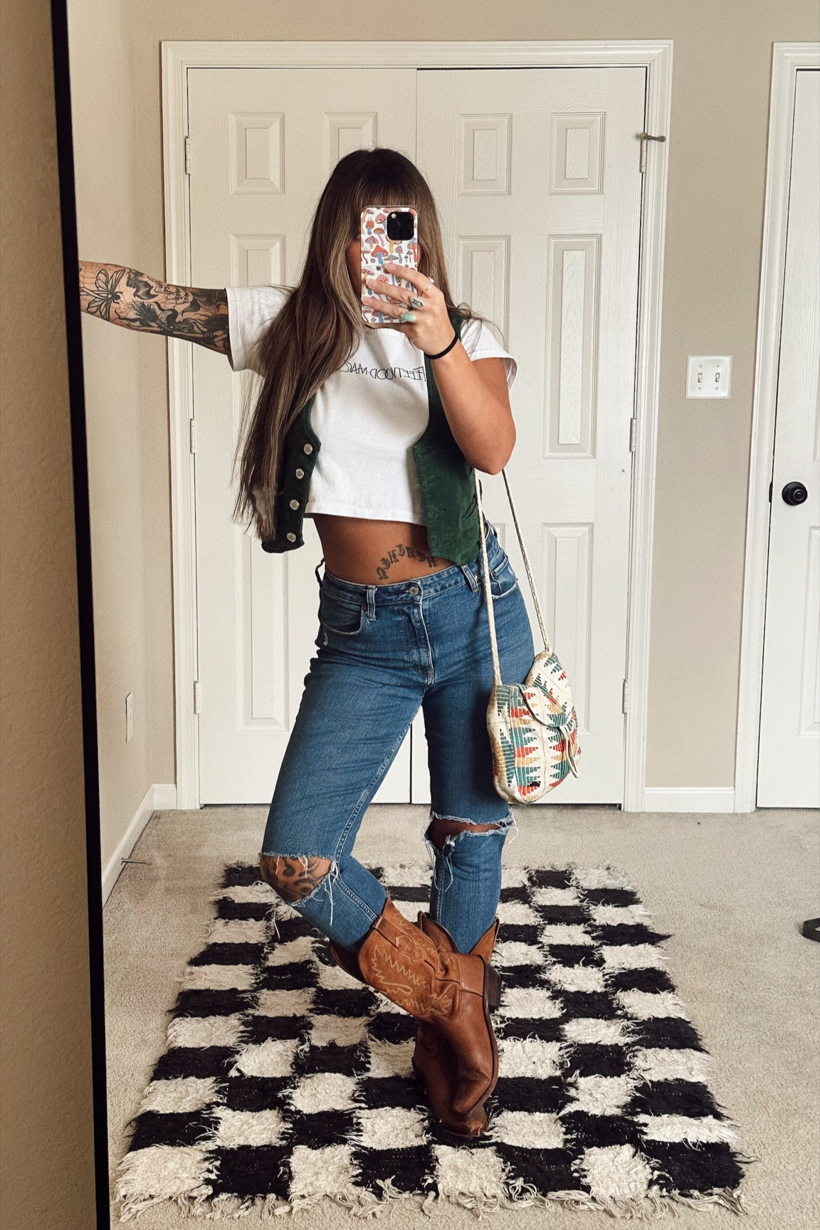 My Fleetwood Mac shirt is vintage from a  concert in 1997 I’m sorry💔
My vest is a size medium and they have many other colors
My jeans are abercrombie curve love high rise skinny, these are a 28 R but are too big and too high rise on me (im 5’4, 150lb currently)
Purse is an old Roxy bag, I can’t find it on here anywhere or on Roxy

#style #styleinspo #ootd #fashion #LTKstyle #LTKfashion

#LTKItBag #LTKStyleTip #LTKShoeCrush