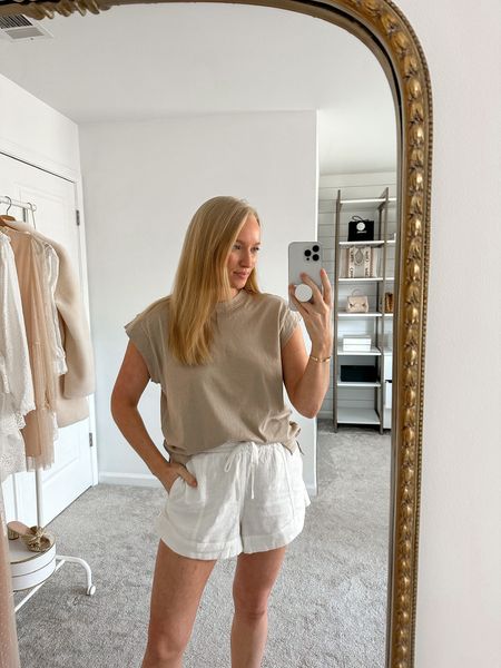 Neutral casual tee from Target that pair perfect with any pant. Perfect to wear on-the-go or for your upcoming travels! Wearing a size small  

#LTKunder50 #LTKtravel #LTKSeasonal