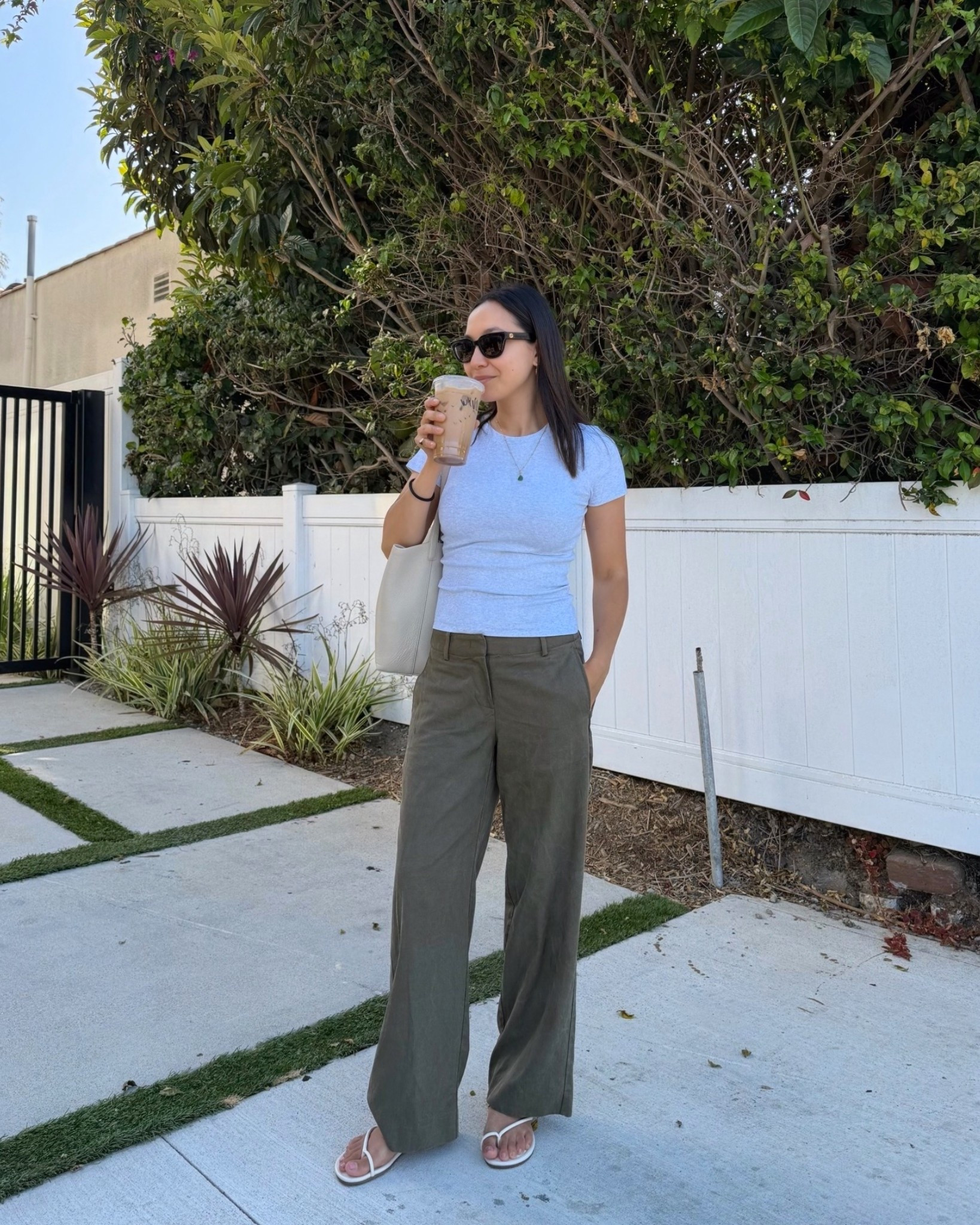 Coffee run in LA - casual ootd 

Aritzia tee small, quality ribbed tee that’s not too long 
Banana Republic everyday pants xs petite (this green color runs bigger than the other colors)

#LTKootd