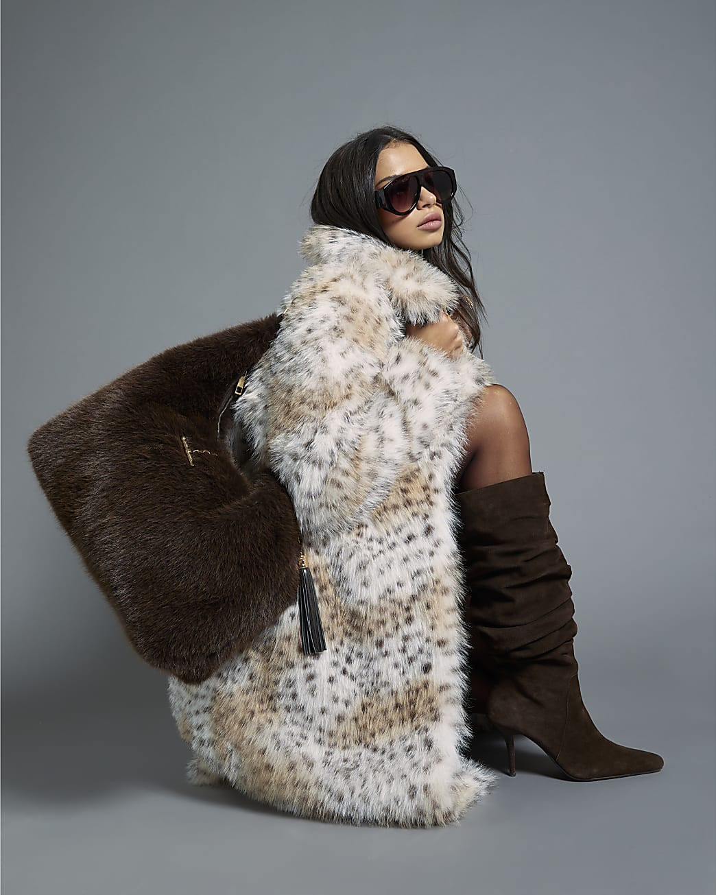 Brown Faux Fur Snaffle Slouch Bag | River Island UK & IE