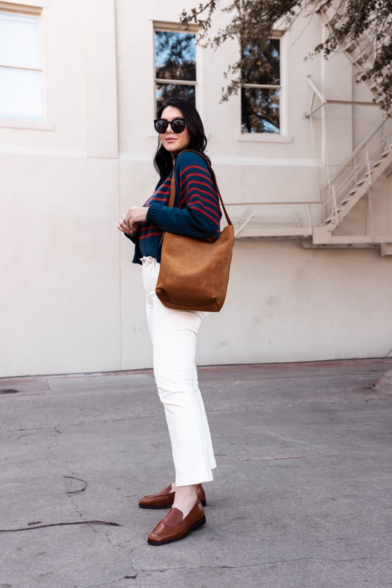 If you’re wanting to break out of your skinny jeans habit, may I introduce you to the Kickout jeans! They can still easily pair with booties, sneakers, heels and flats but they feel a bit updated. This pair runs TTS and stretch a tiny bit with wear. I’m in the 30.

The sweater runs slightly looser I am in the large. 

#LTKSeasonal