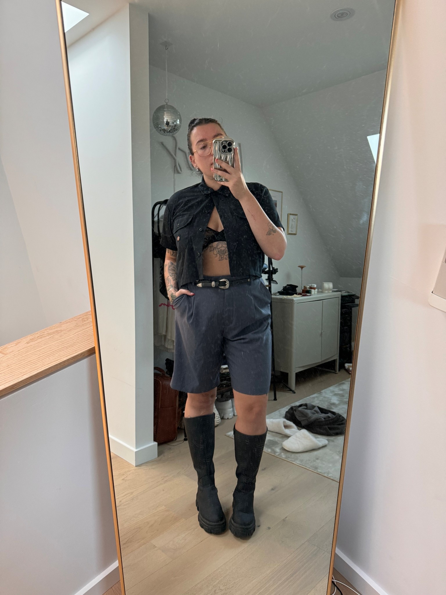Night Out Look | Mid-Size Lesbian Style in Grey Pinstripes 🖤🌙

📌 Pin Description:
Serving cool, confident, queer energy all night long—this mid-size night out fit is low-effort, high-impact:
🩶 Grey pinstripe long trouser shorts for tailored drama
🖤 Tall biker boots that mean business
💥 Silver buckle belt to pull it all together
🧥 Cropped Dickies button-up left open for just the right amount of attitude

Perfect for bar hangs, rooftop nights, or dancing with the girls. Masculine edge + femme polish = iconic. Some links may be affiliate links, and I may earn a small commission 💸

#MidSizeStyle #LesbianFashion #TomboyFemme #NightOutOutfit #QueerStyle #BikerBoots #DickiesStyle #PinstripeShorts #SummerNightLook #AffiliateDisclosure 

 #LTKMidsize #LTKStyleTip