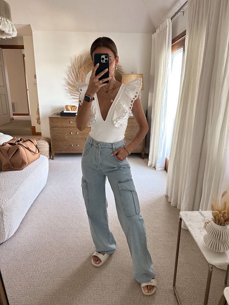 These baggy cargo jeans are having a major moment in my life so i naturally wanted to snag them in the Agolde cause they’re the best! This summer look is perfection paired the one piece suit I’m
Converting as a bodysuit. All tts. Xs on suit and 25 on jeans 

#LTKstyletip #LTKshoecrush #LTKswim