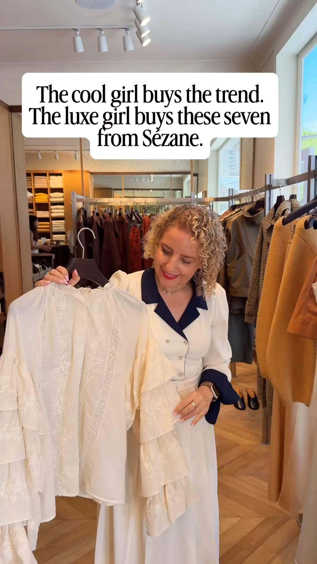 The new Sézane fall collection from the Brentwood Country Mart boutique. 

Seven investment pieces built for a timeless wardrobe: a burgundy leather bucket bag, an olive knit cardigan with gold buttons, a white cotton blouse with a ruffled neck, straight leg jeans in a mid wash, an olive leather jacket, cream leather ballet flats, and a lace panel cardigan. 

French girl style that holds up season after season. Elevated basics and wardrobe staples for fall 2026, luxe looks on a real budget.