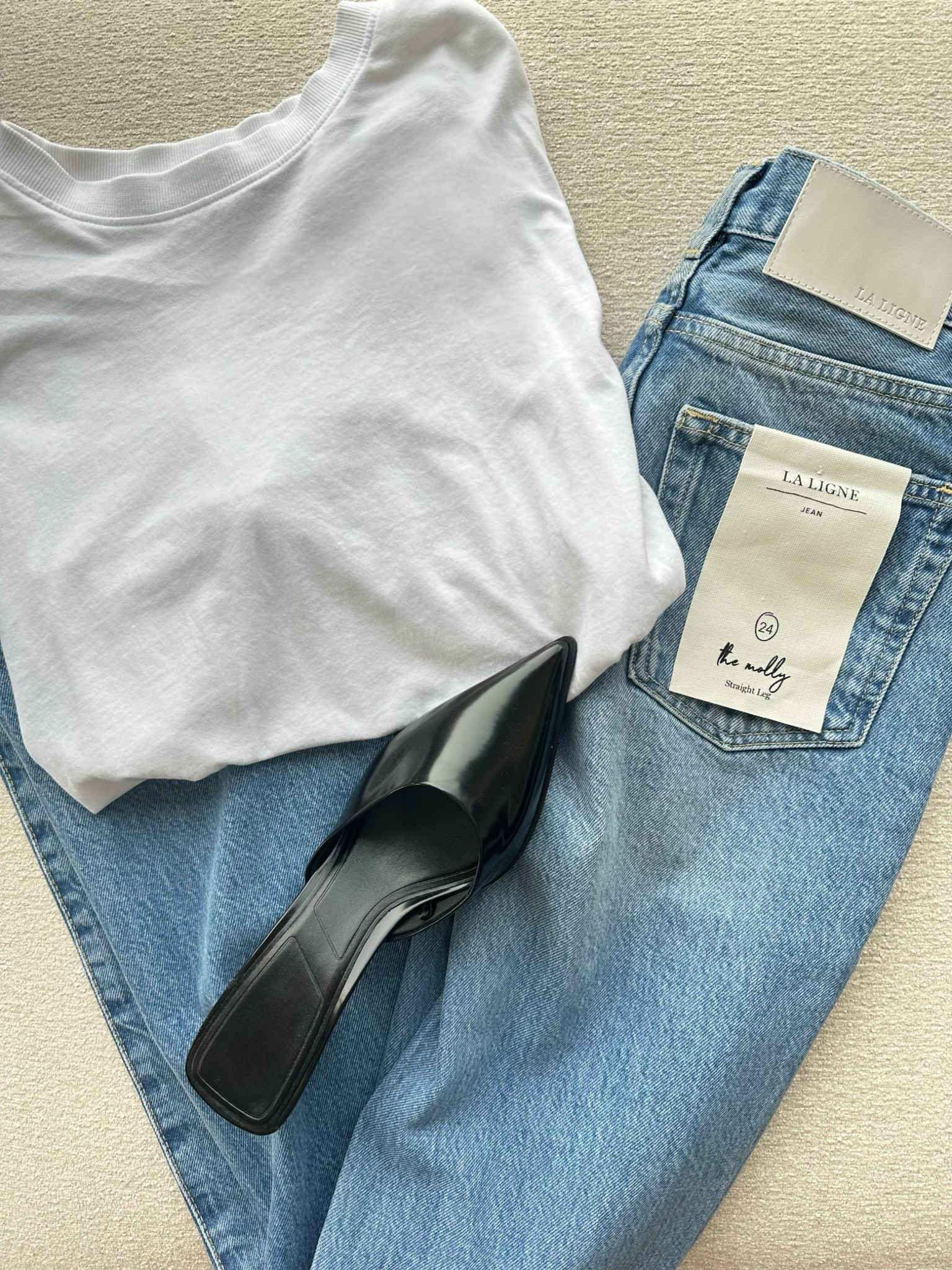 Timeless, effortless, and endlessly wearable. The Molly High-Rise Straight Jeans from @lalignenyc are a must-have for building an elevated everyday wardrobe. Styled here with a crisp white tee and kitten heels—because good denim makes the outfit. #ad