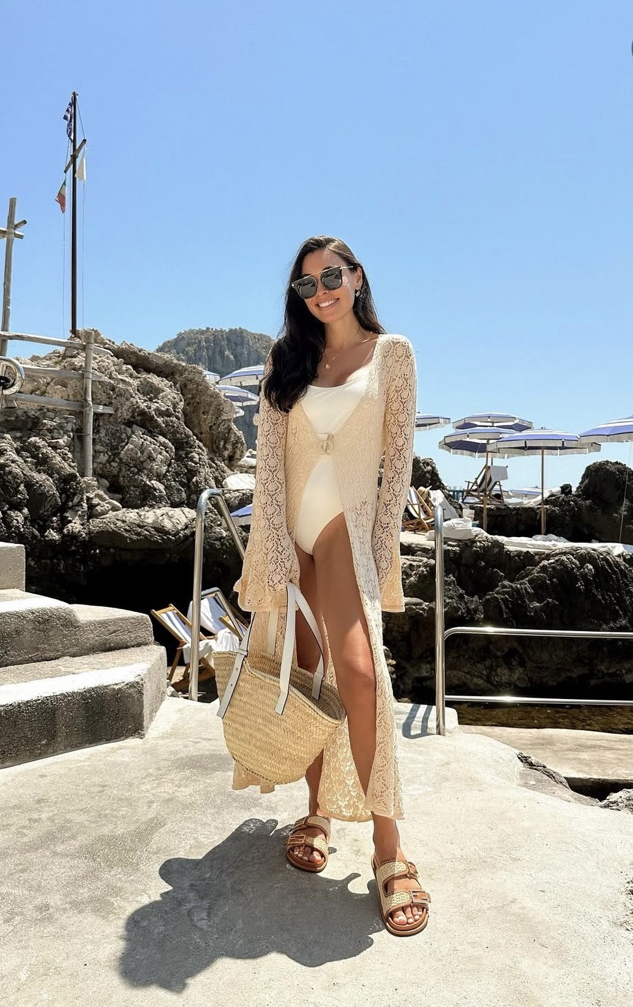 Knit coverup, La Fontelina Capri, swim coverup, swimwear, Capri Italy, summer fashion, vacation outfit, white swimsuit. 

#LTKSwim #LTKSeasonal #LTKItBag