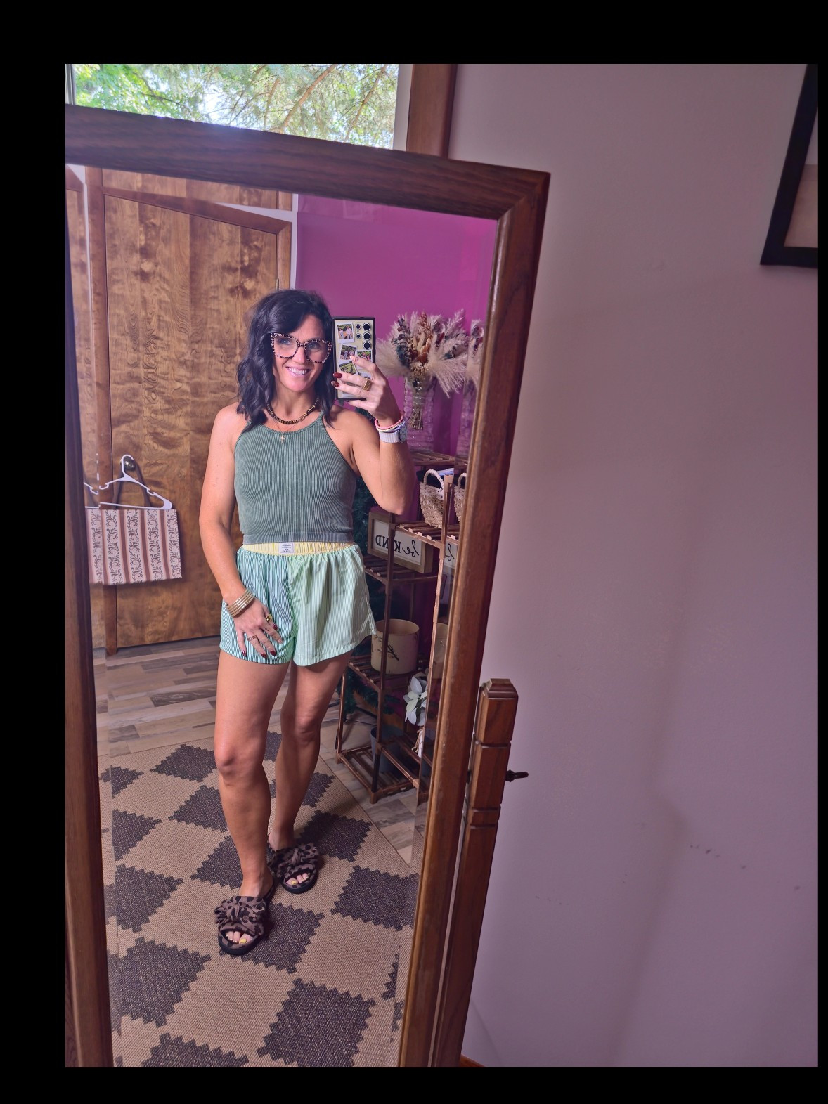 Hot, humid Michigan days call for an outfit like this ☀️ This tank is buttery soft and SO comfy, and these shorts are seriously the perfect length. Plus, the fun mix of colors makes the whole outfit. 💚✨ #OOTD #SummerStyle #ComfyStyleer 

#LTKootd #LTKgrwm #LTKOver40