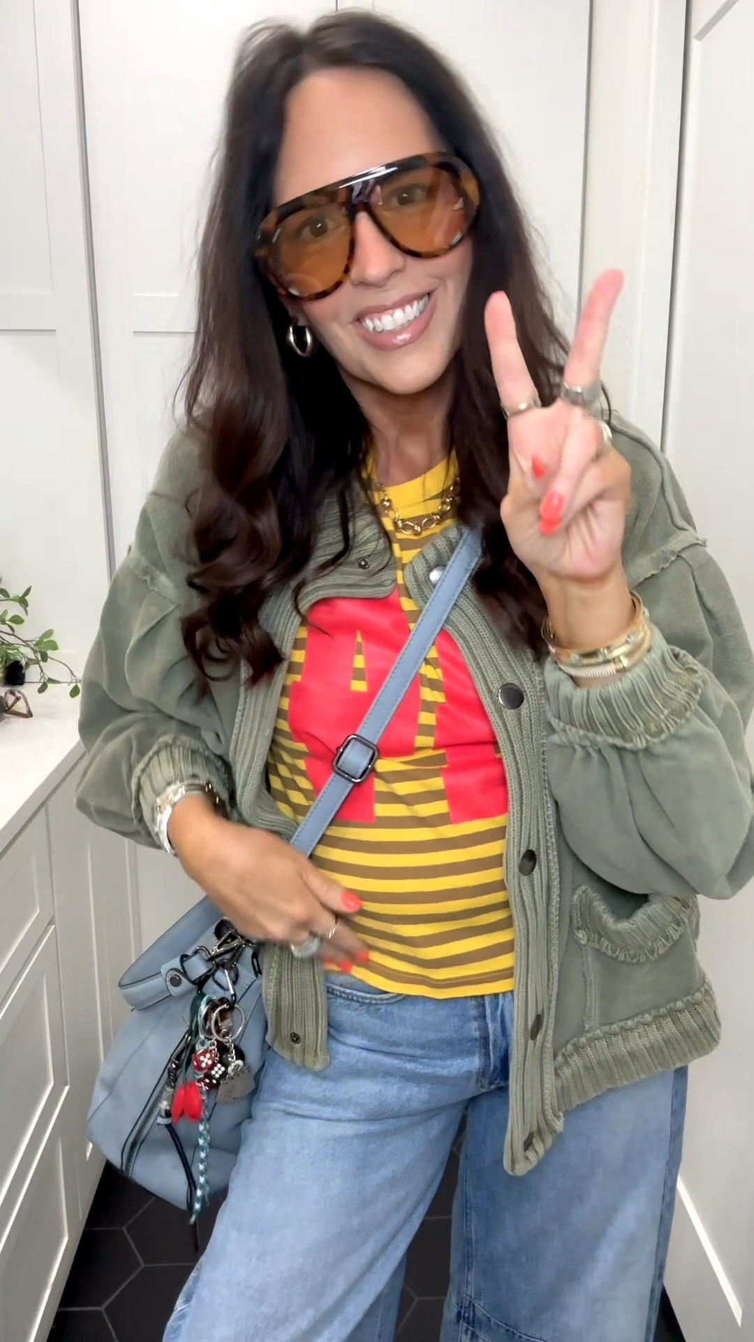 Wearing the large in the jacket and the baby tee. Jeans are TTS. Shoes are size 8 and I’m a true size 8.5 and have plenty of room.  Purse and shades are in Amazon storefront. 

#LTKTall #LTKOver40 #LTKootd