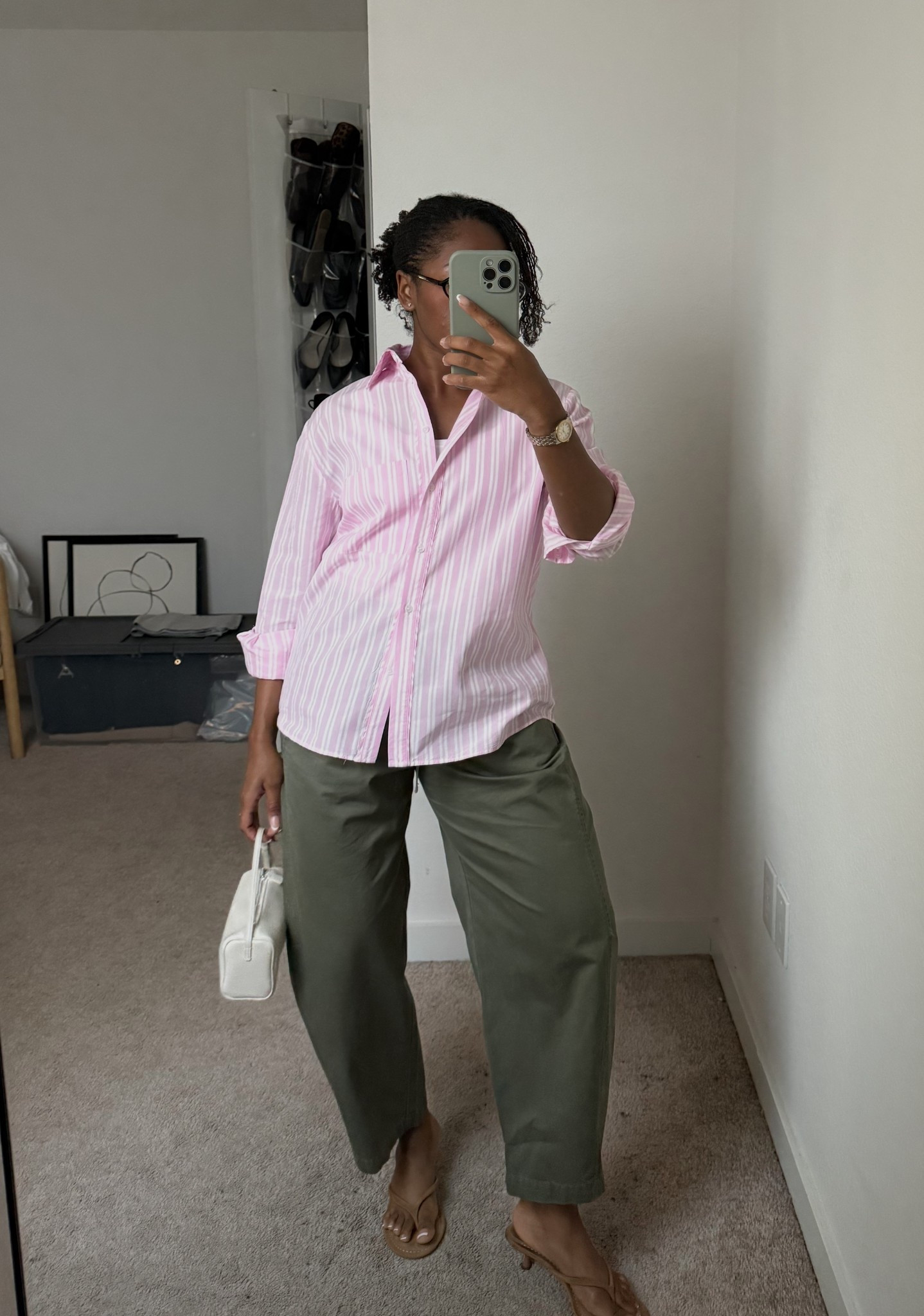 pink stripe button up with barrel pants outfit 

olive pants, white mini bag, suede thong sandals, summer outfit, modest dressing

#LTKPetite #LTKStyleTip #LTKSeasonal