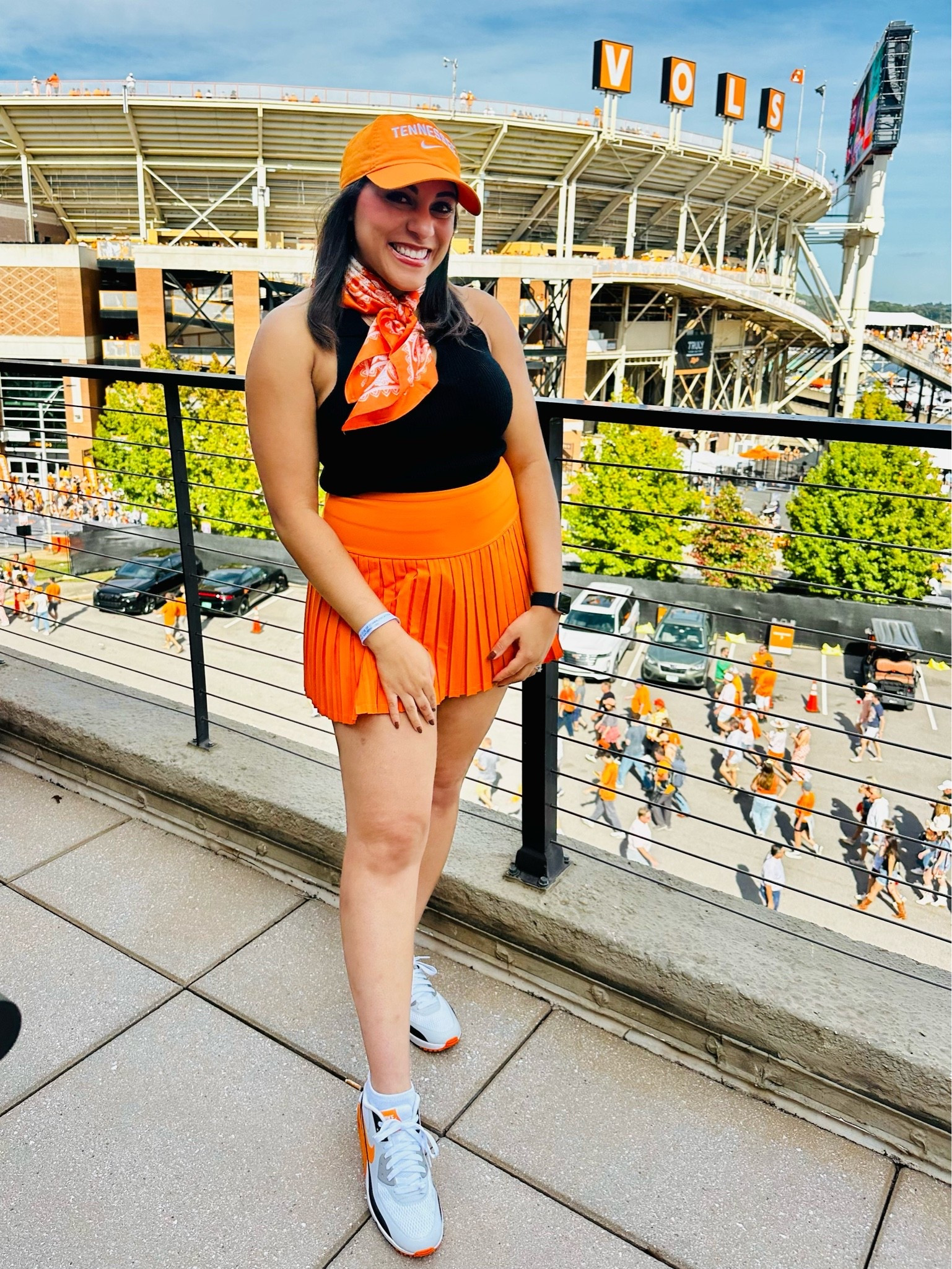 Football, sports wear, orange and black, black top, orange skirt, activewear, with Nike Air sneakers

#LTKootd #LTKActive #LTKSeasonal
