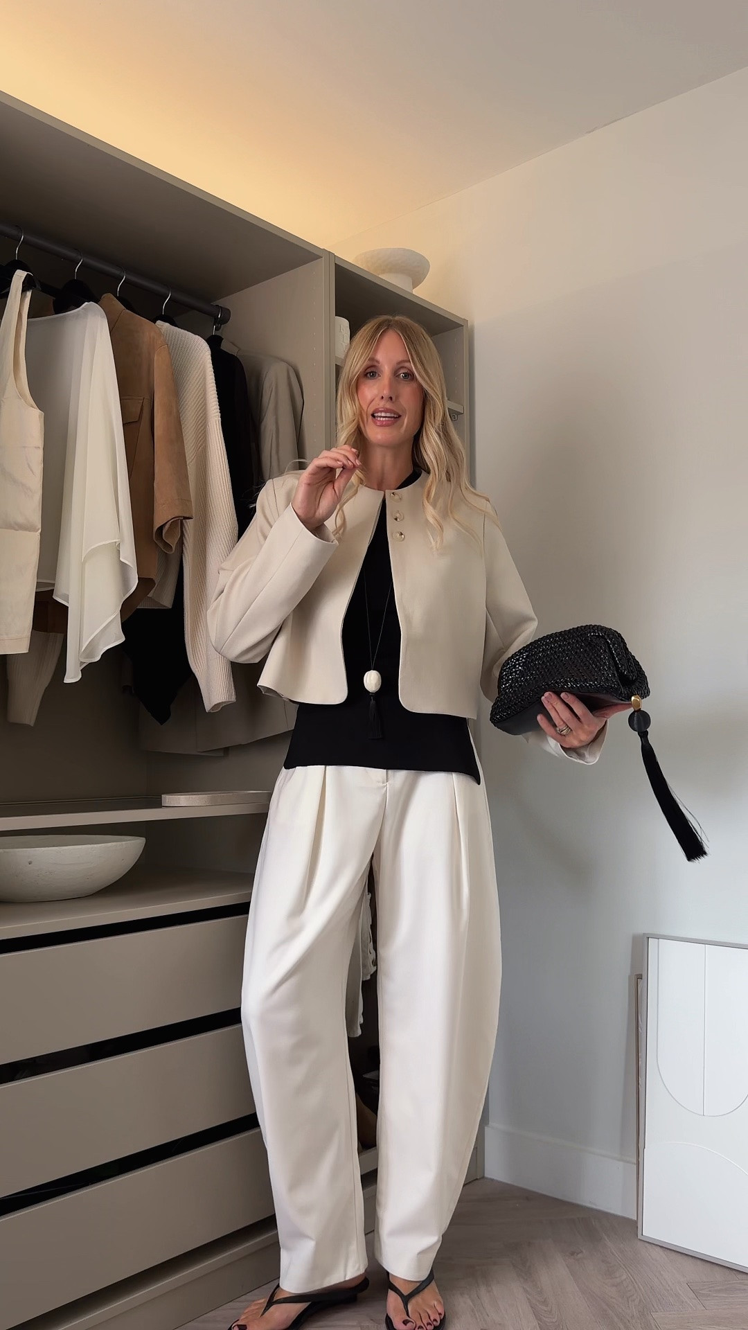 When styling a simple outfit, It’s all about proportions 🤍 

Barrel leg trousers add width through the hip, which makes them a great silhouette for balancing an inverted triangle shape. But you don’t need to be an inverted triangle to wear them, if you’re wearing a wider-leg or barrel-leg trouser, a cropped jacket is a really easy way to balance the proportions, define your waist and create more of an hourglass effect. 

It’s a simple styling trick that makes a big difference to how the whole outfit feels.

SIZING: 
Barrel leg trousers — size 8
Asymmetric top — size S (on sale)
Cropped collarless blazer — size 8 (I sized down as it’s oversized; I’m an inverted triangle with a larger chest).

#dissh #simpleoutfit #LTKsale

#LTKuk #LTKdatenight #LTKstyletip
