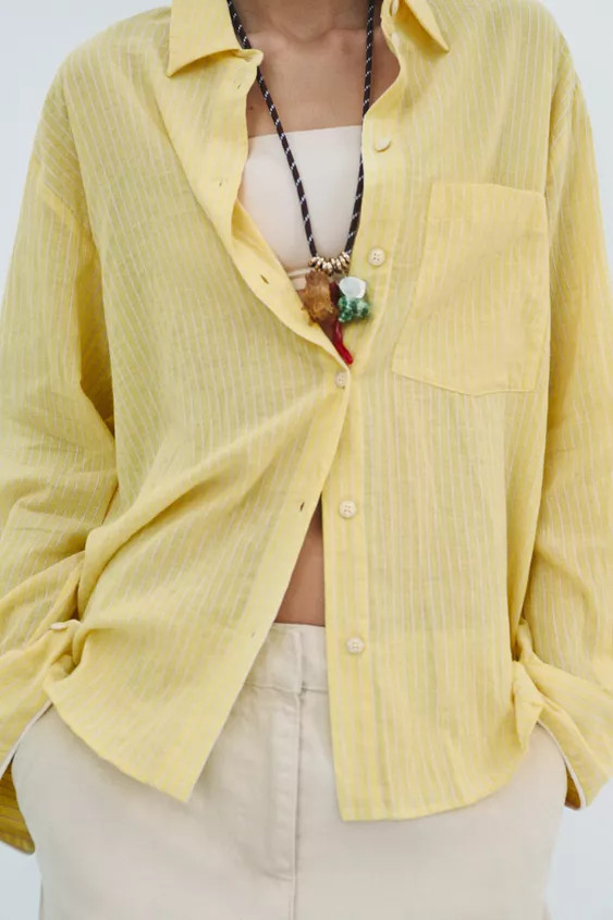 ZARA WOMAN COLLECTIONCotton shirt. Featuring a lapel collar, long sleeves with cuffs, a patch poc... | Zara US