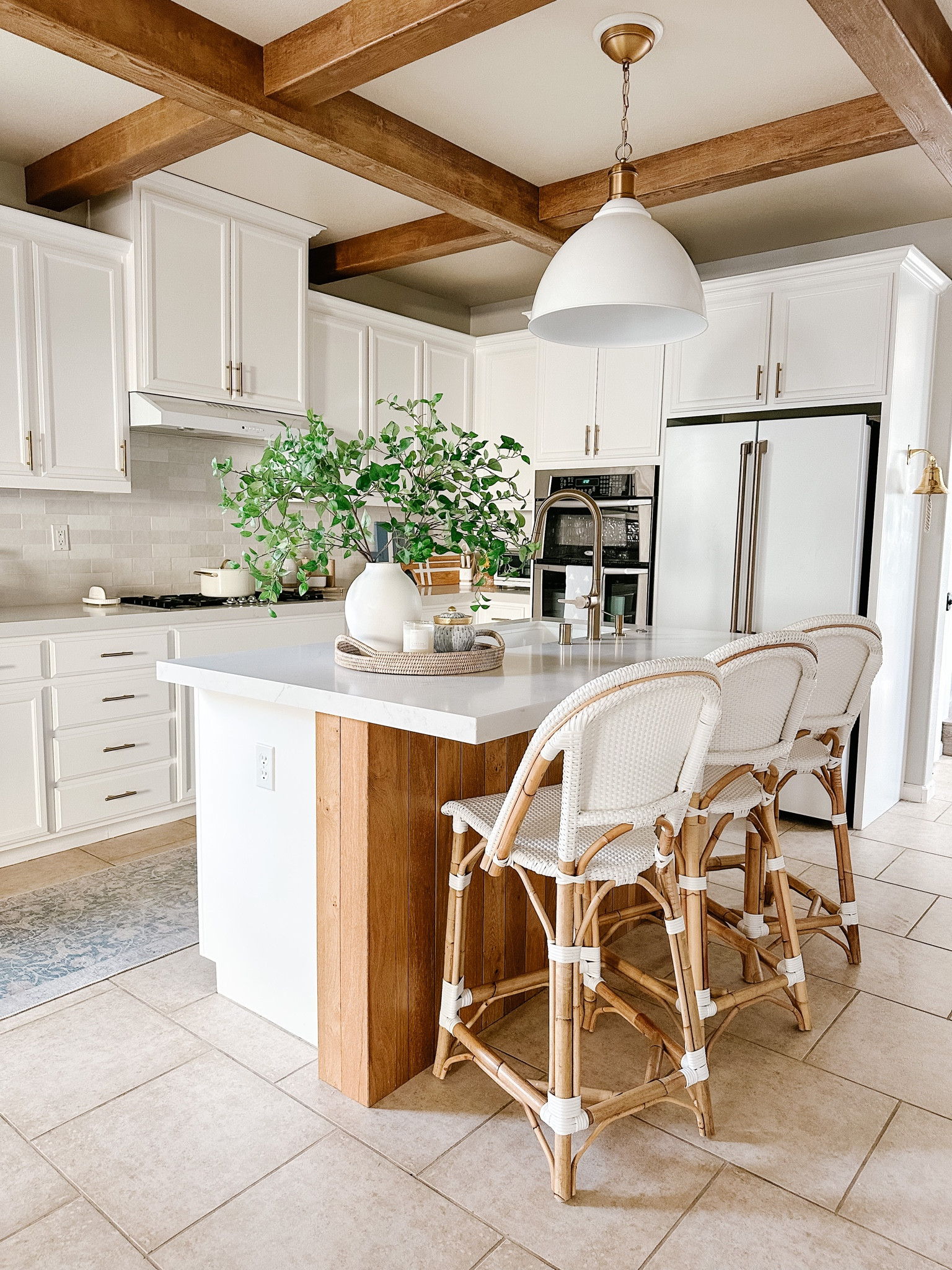 I had many of you ask what were the first few things we did to the kitchen when I shared in stories yesterday and if you look back you can see we worked on the cabinet color first. They have been painted for 5 years now and they have actually held up great {even with the kids running into them.} One of the projects we still want to do is get new flooring installed it’s a big one though. 

#LTKhome
