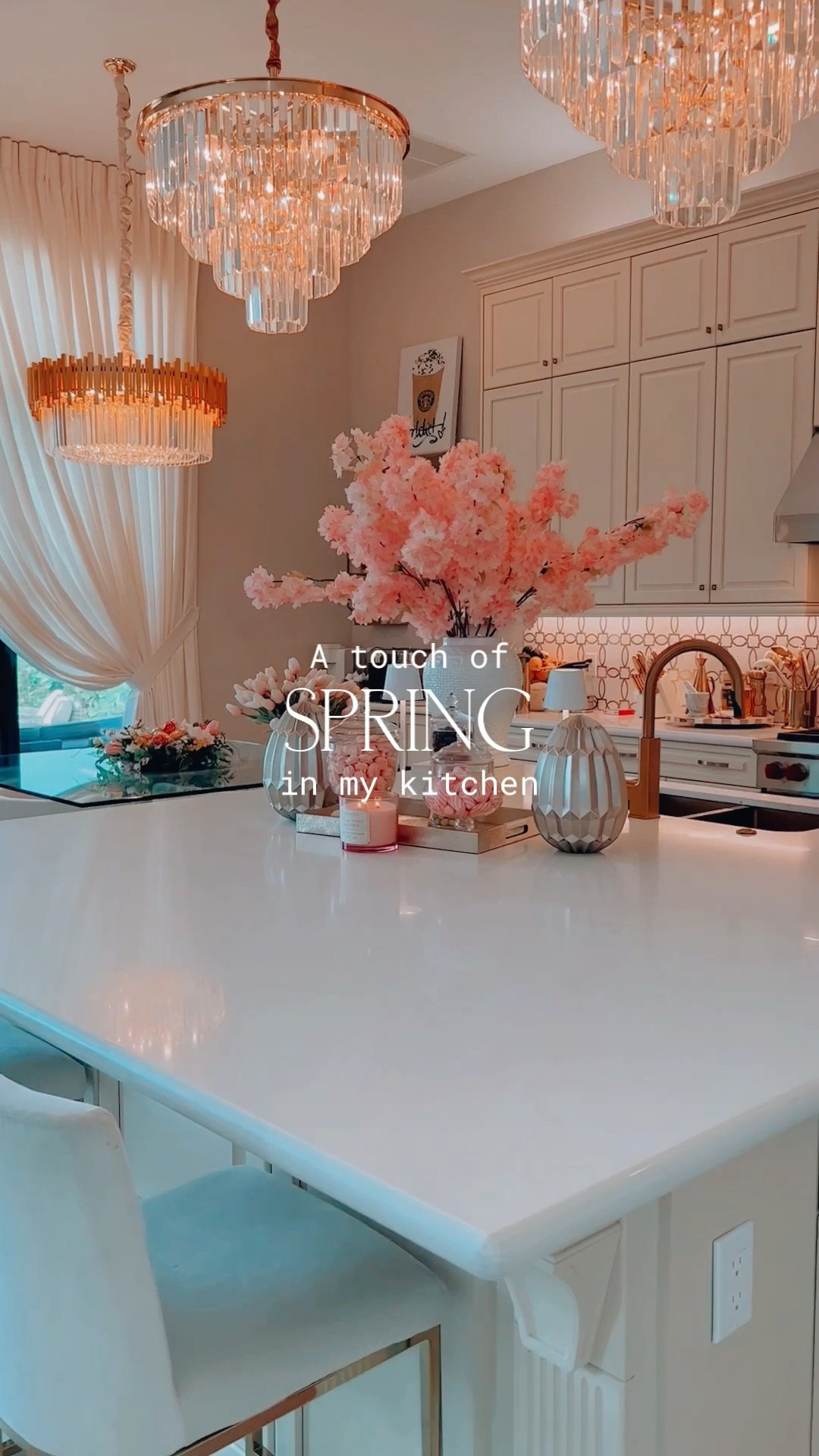 Hey, hey, hey! Can you feel the excitement in the air? Spring is right around the corner, and I'm so ready for it! To celebrate the season, I decided to create a fun and stylish spring vignette for my kitchen island.
I started with my favorite white and pink ginger jars - I just can't get enough of them! Then I added some high-end florals like cherry blossoms and tulips, and they look so real it's hard to believe they're not. The combination of these elements creates a lively and invigorating atmosphere that's perfect for spring.
To add a touch of glamour and sophistication, I mixed in a stunning gold leather tray. And of course, there have to be some treats to nibble on, so I used apothecary jars to store some goodies.
But what really makes this vignette pop are the playful modern gold egg sculptures I found at a Homegoods store in Boston. They're quirky, fun, and add a touch of personality to the display.
And let's not forget about the lighting! My go-to Design Uniko touch lamps are a staple in every vignette I create. For this one, I went with the white ones to keep things fresh and modern.
All in all, I'm thrilled with how this spring kitchen vignette turned out. It's youthful, fun, and inviting, while still being sophisticated enough to elevate any home decor. I hope it inspires you to add some springtime energy to your own space. Happy decorating!

#LTKhome #LTKSeasonal