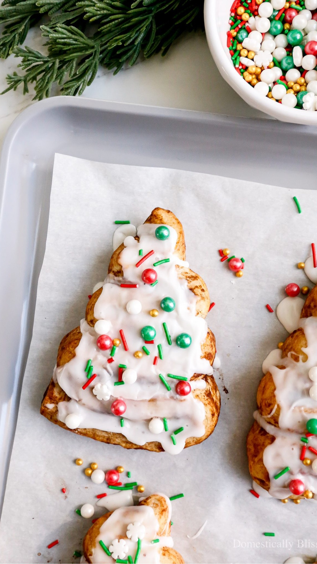 These Christmas Tree Cinnamon Rolls are an easy way to turn store-bought cinnamon rolls into a fun family Christmas tradition.

See recipe:
https://domesticallyblissful.com/christmas-tree-cinnamon-rolls/

🔗 Join our newsletter: https://domesticallyblissful.com/newsletter/  

#LTKSeasonal #LTKHoliday #LTKKids