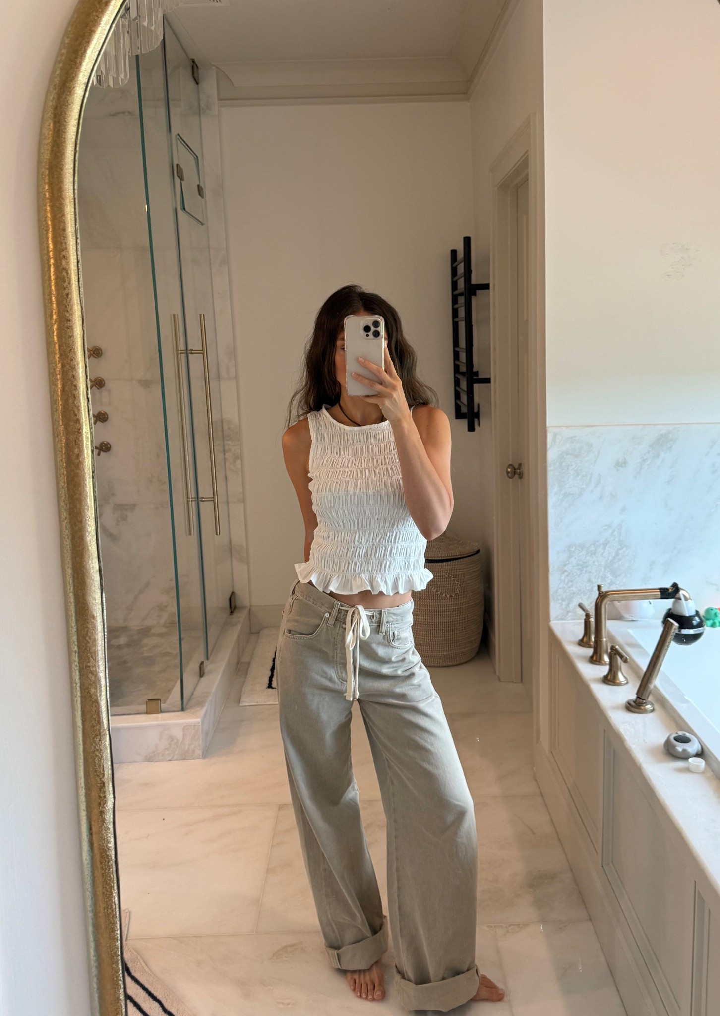 23 in denim (runs large) 
Small in top 
