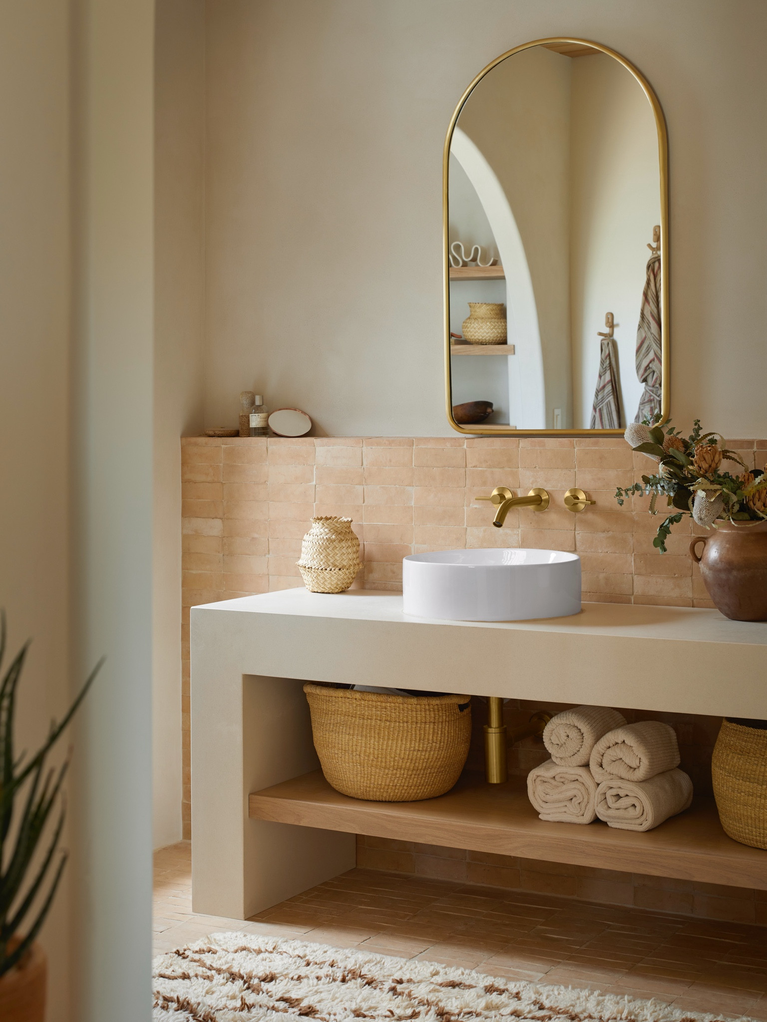 Neutral desert bathroom with arched brass/gold mirrors. 

Linking to my baskets and bathroom hardware + similar  

#LTKHome