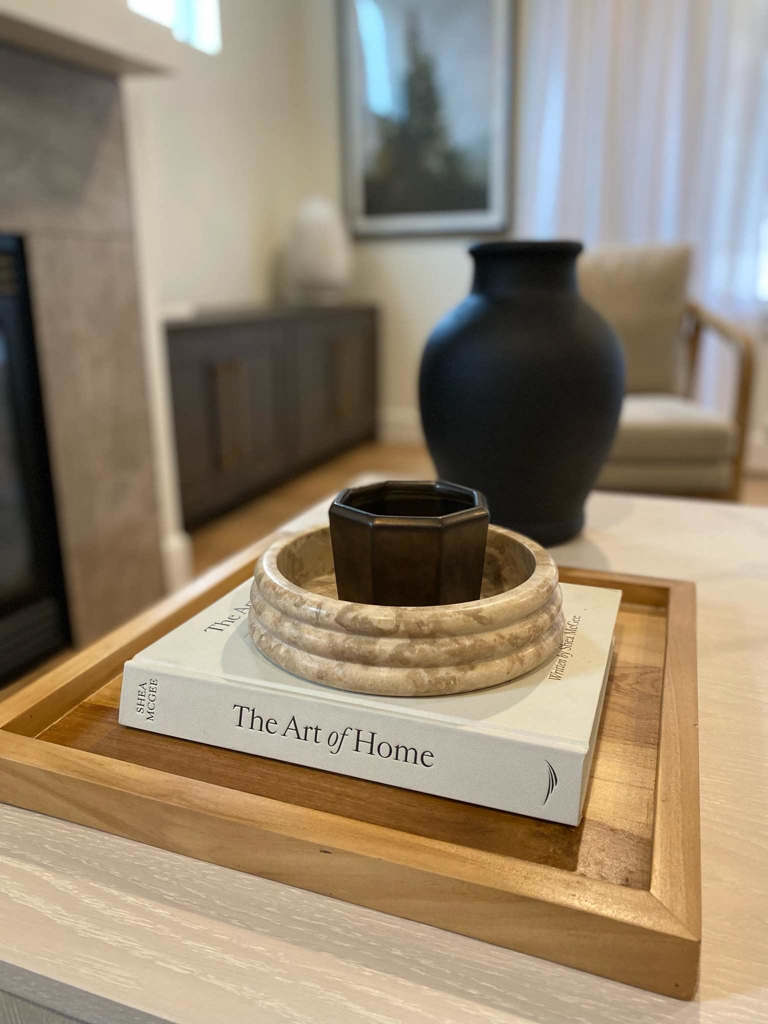 Coffee table styling! I love the layered look when it comes to decor

#LTKhome